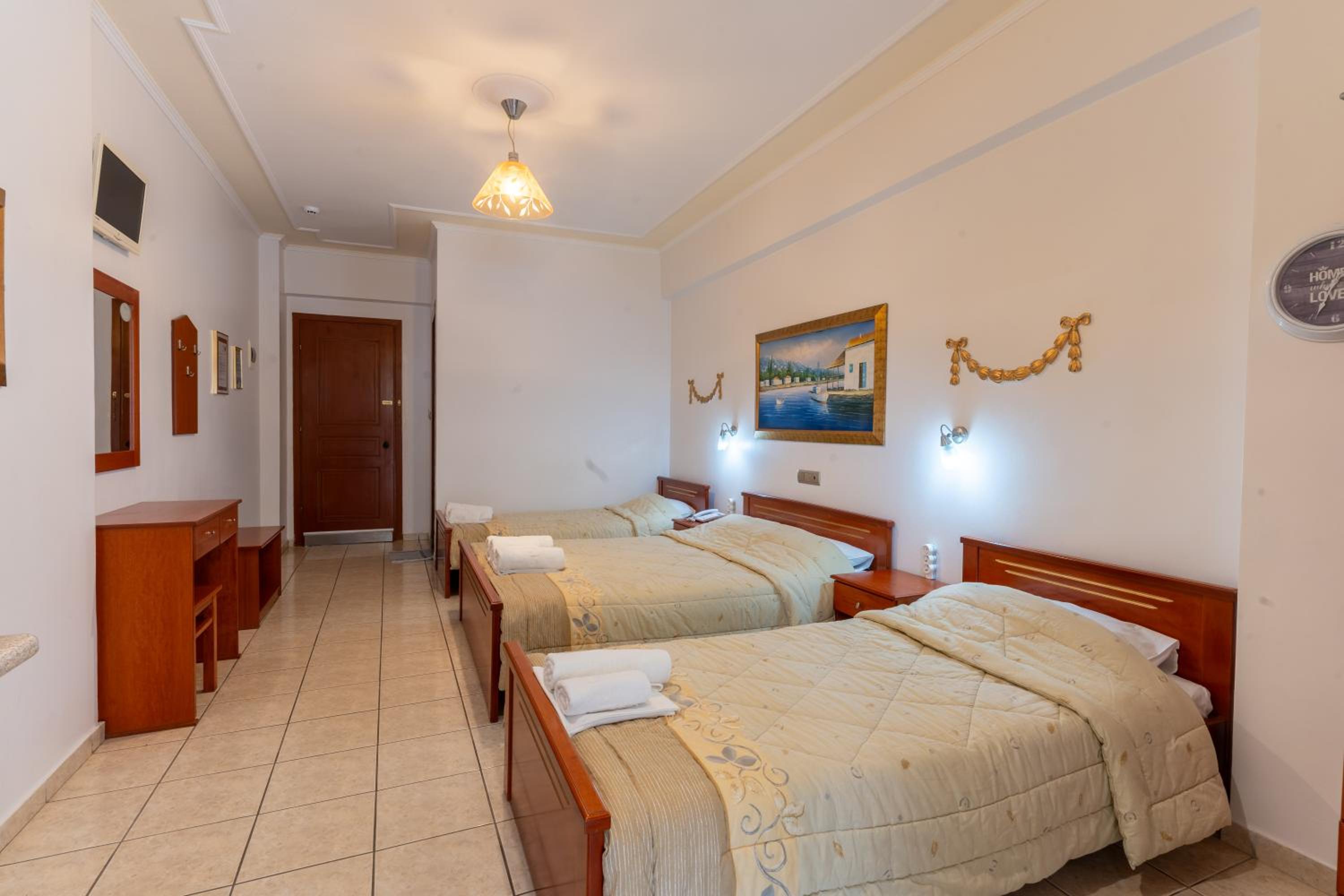 Quadruple Room with Balcony photo 2