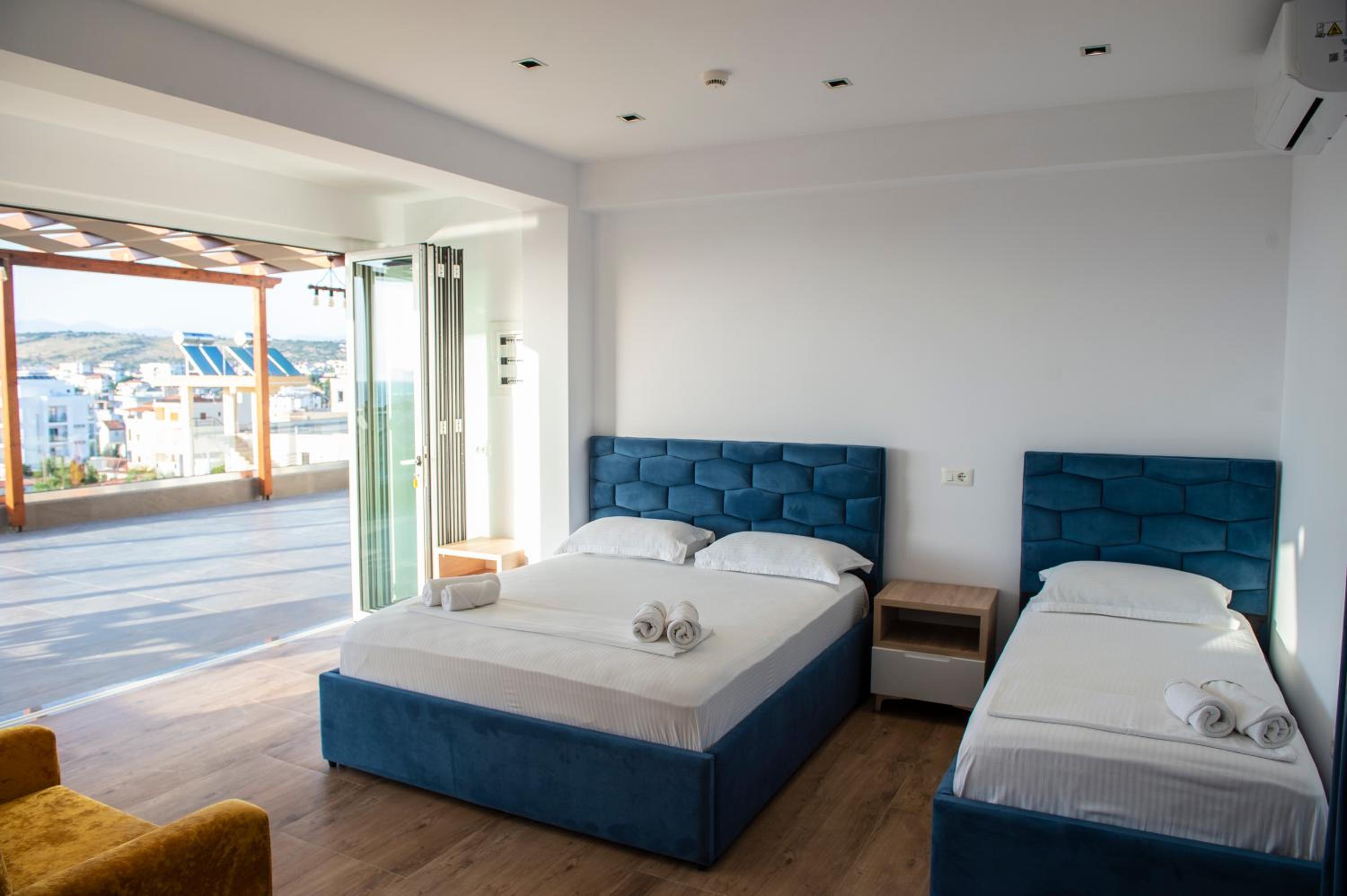 Quadruple Room with Balcony photo 3