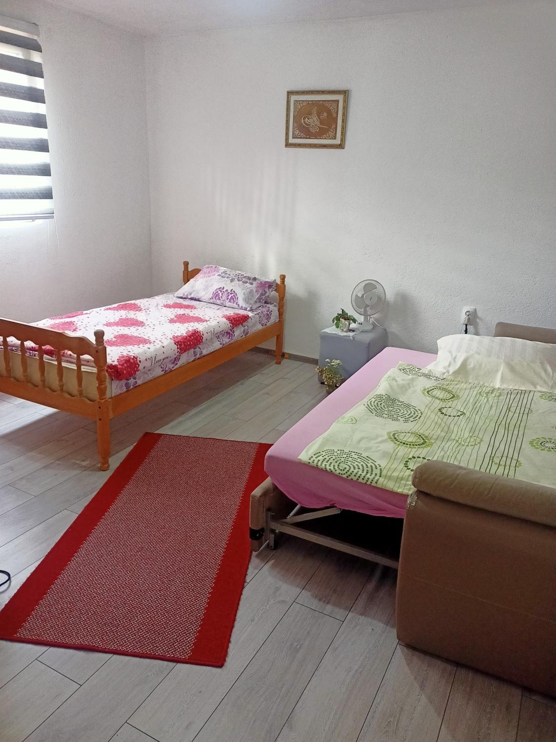 Three-Bedroom Apartment photo 1