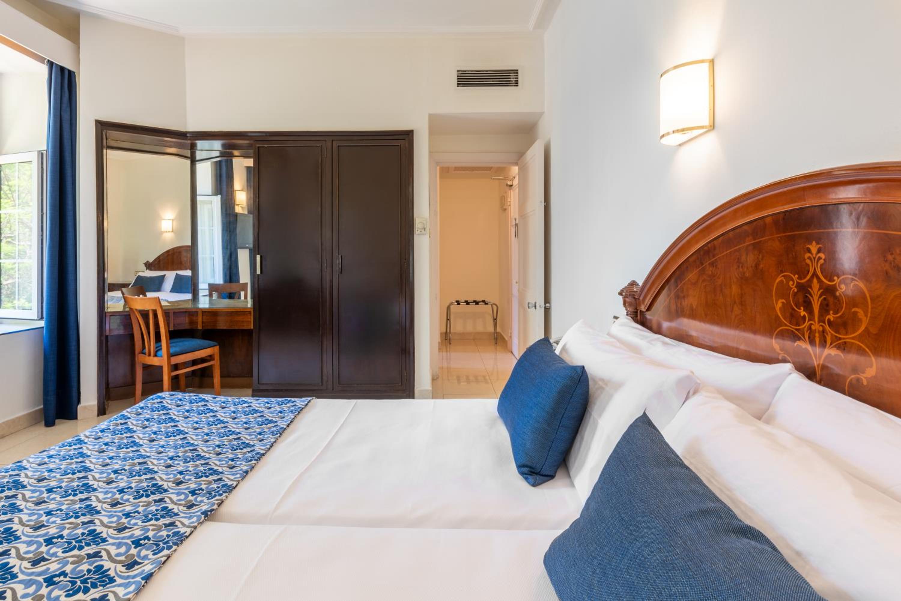 Habitación Doble con cama supletoria (2 adultos + 1 niño)