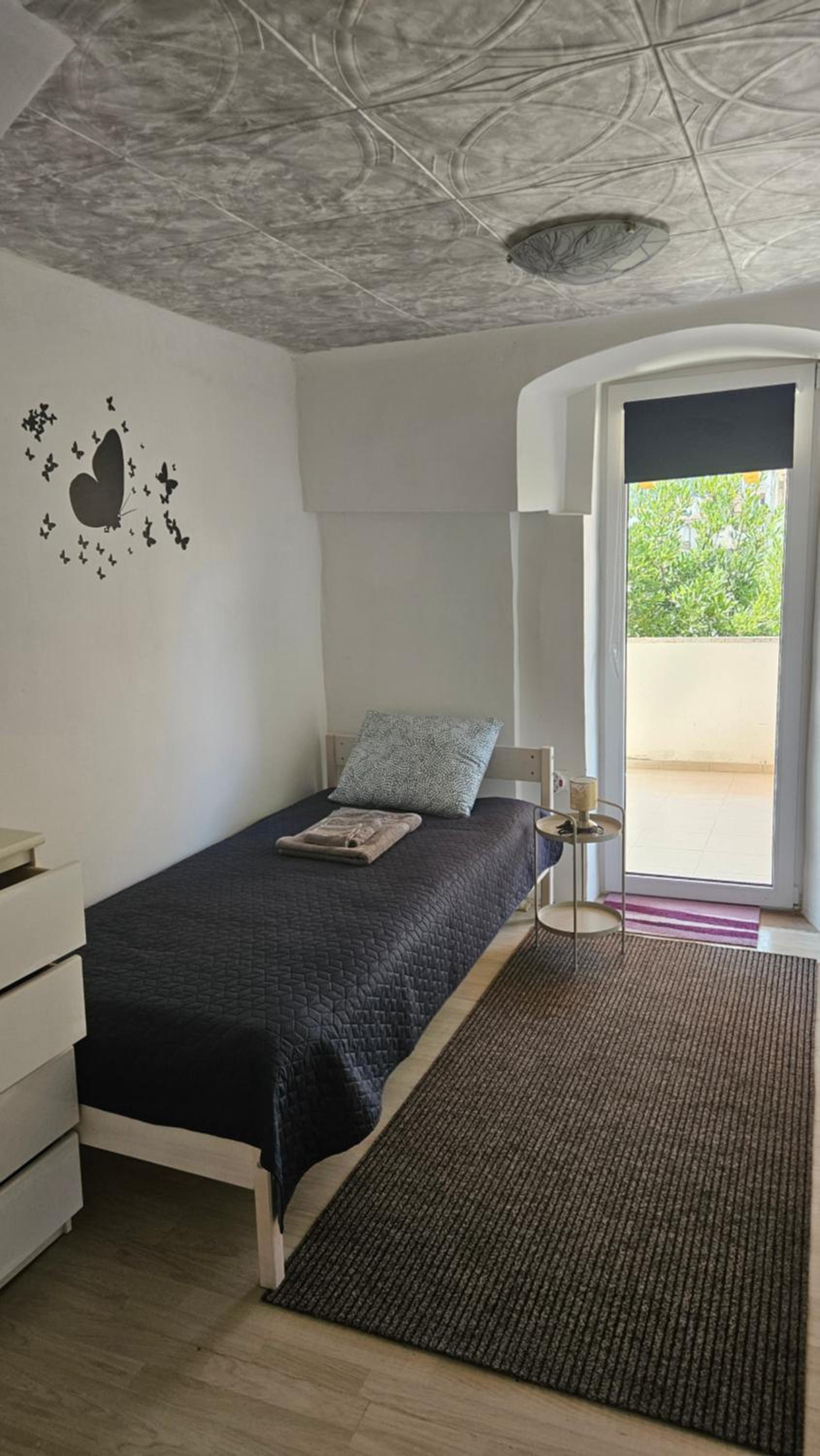 Three-Bedroom Apartment photo 1