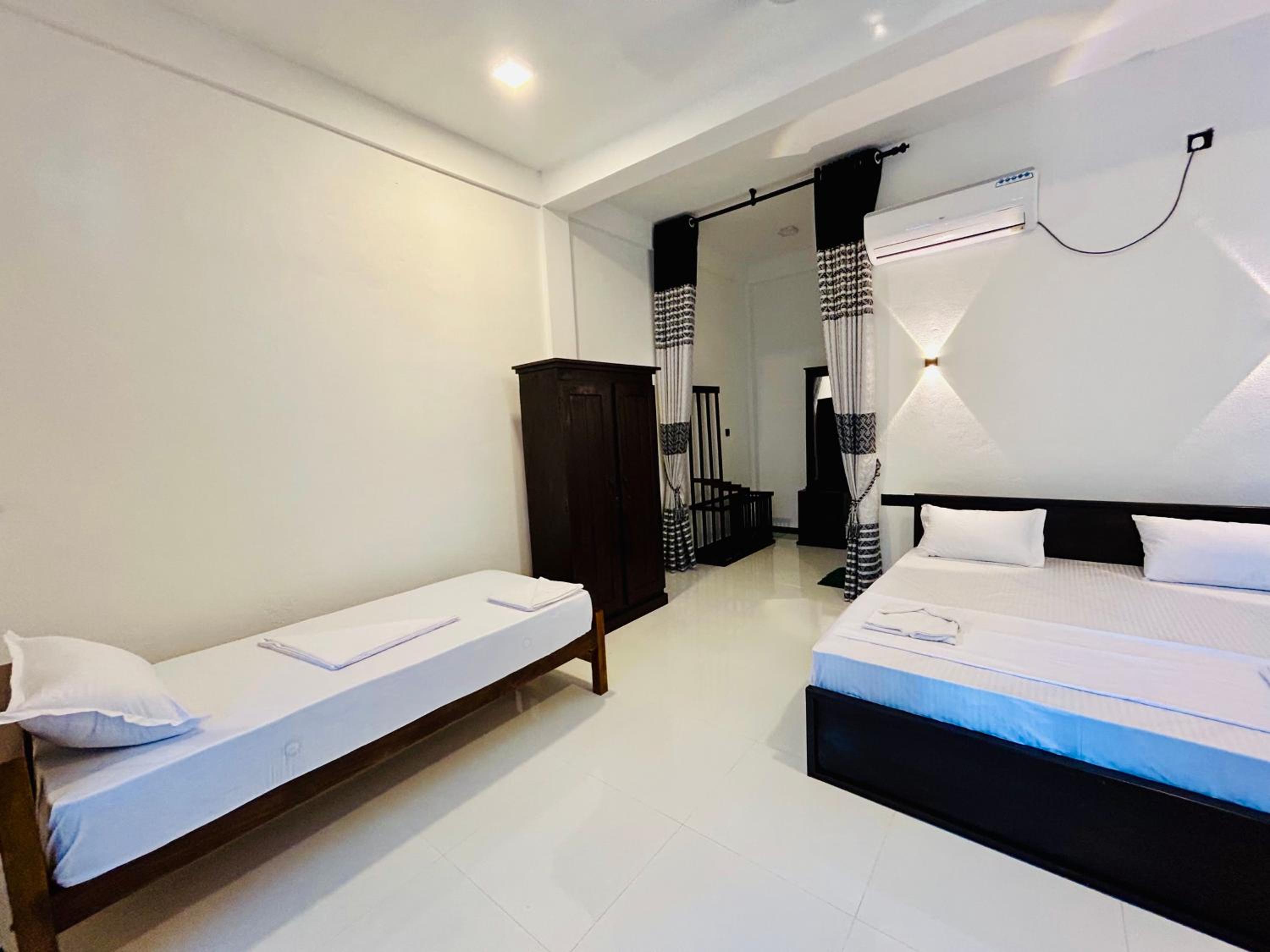 Deluxe Triple Room photo 1