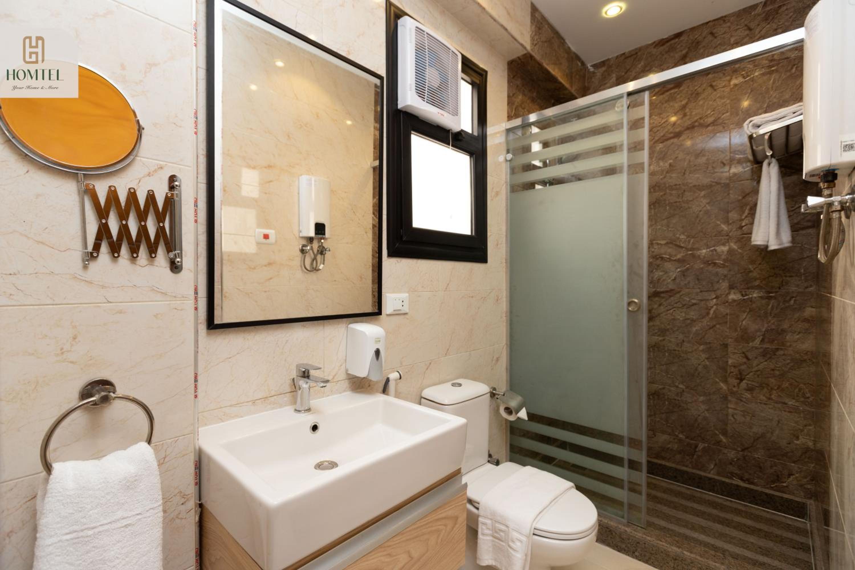One-Bedroom Apartment with Balcony and City View
