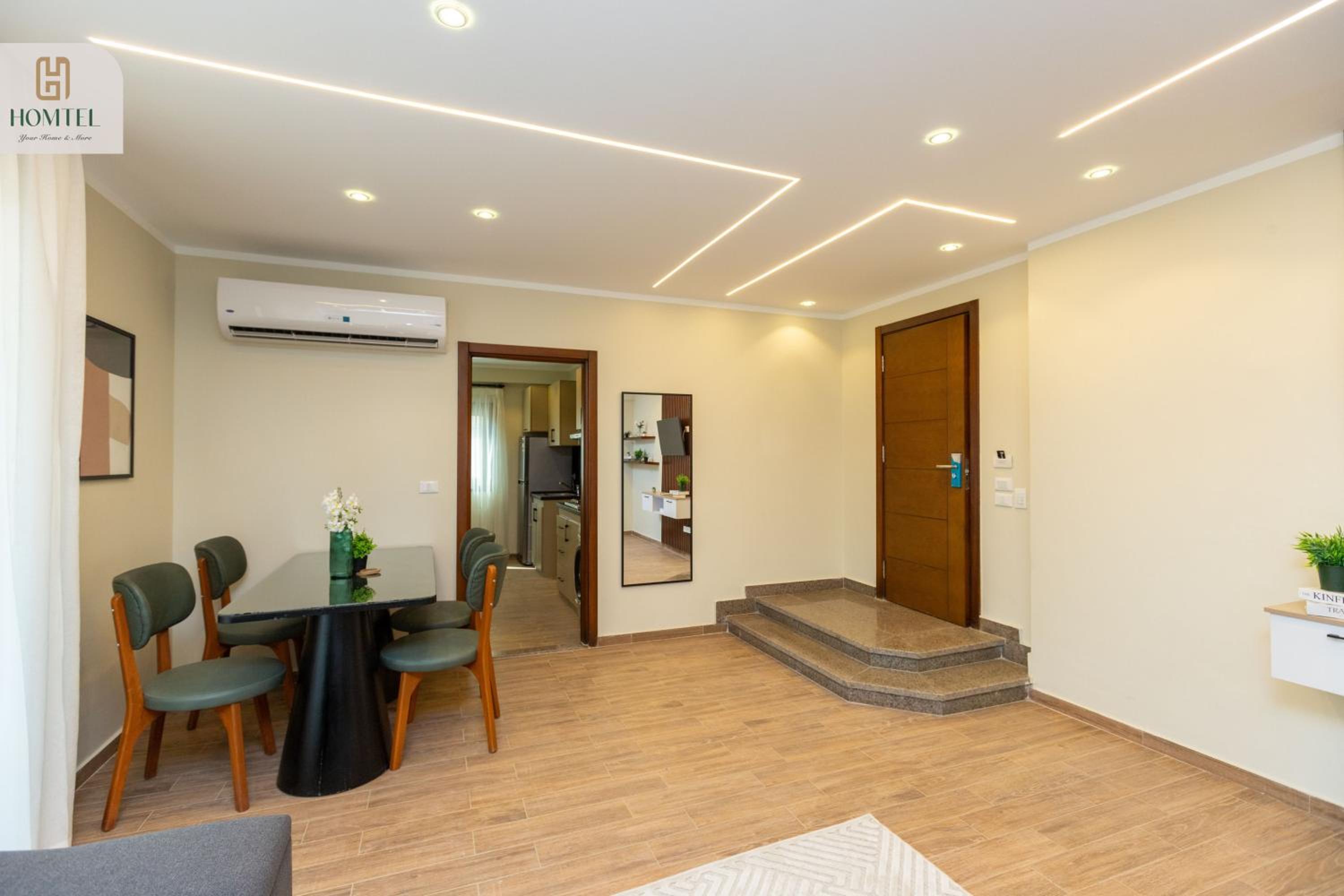 One-Bedroom Apartment with Balcony and City View photo 2