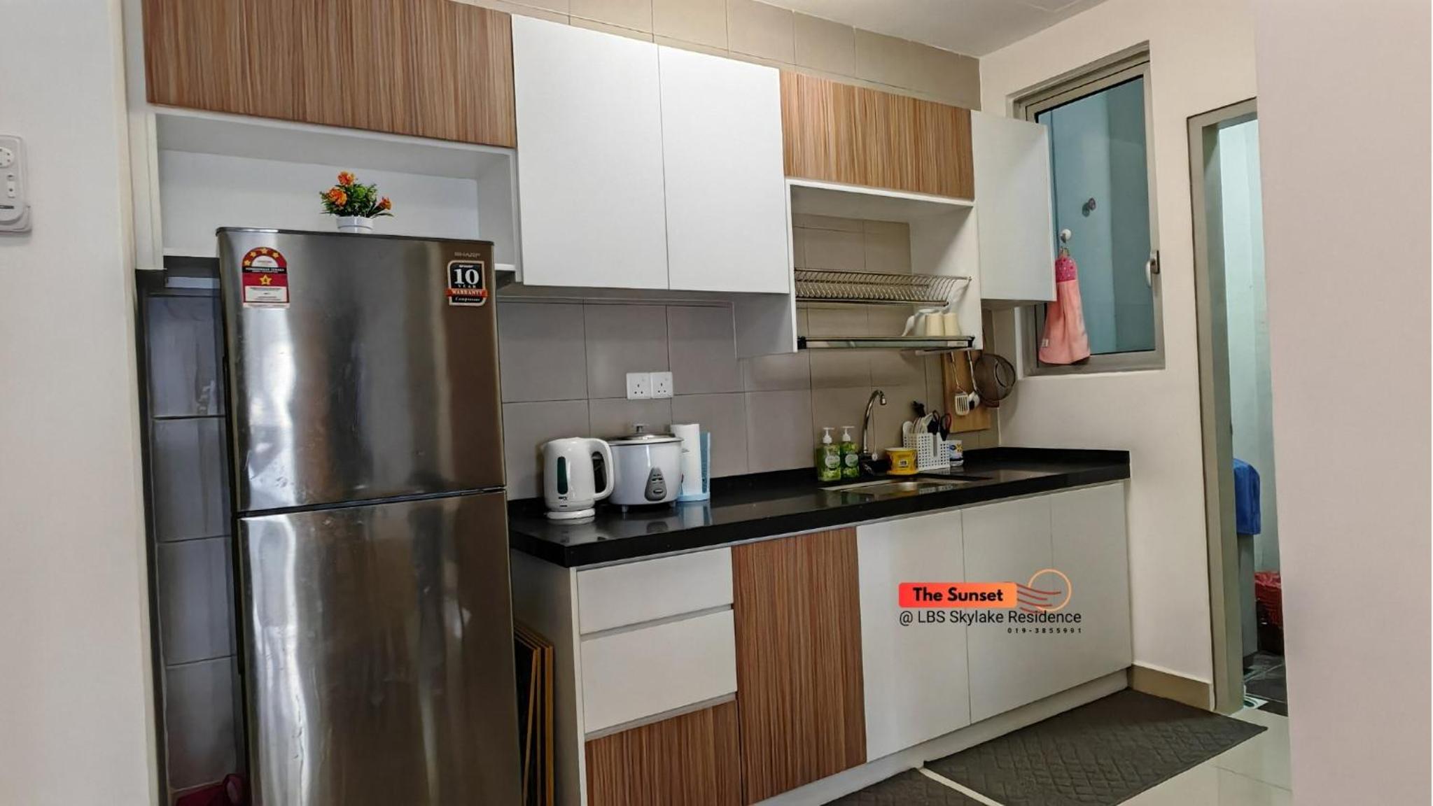 Three-Bedroom Apartment photo 2