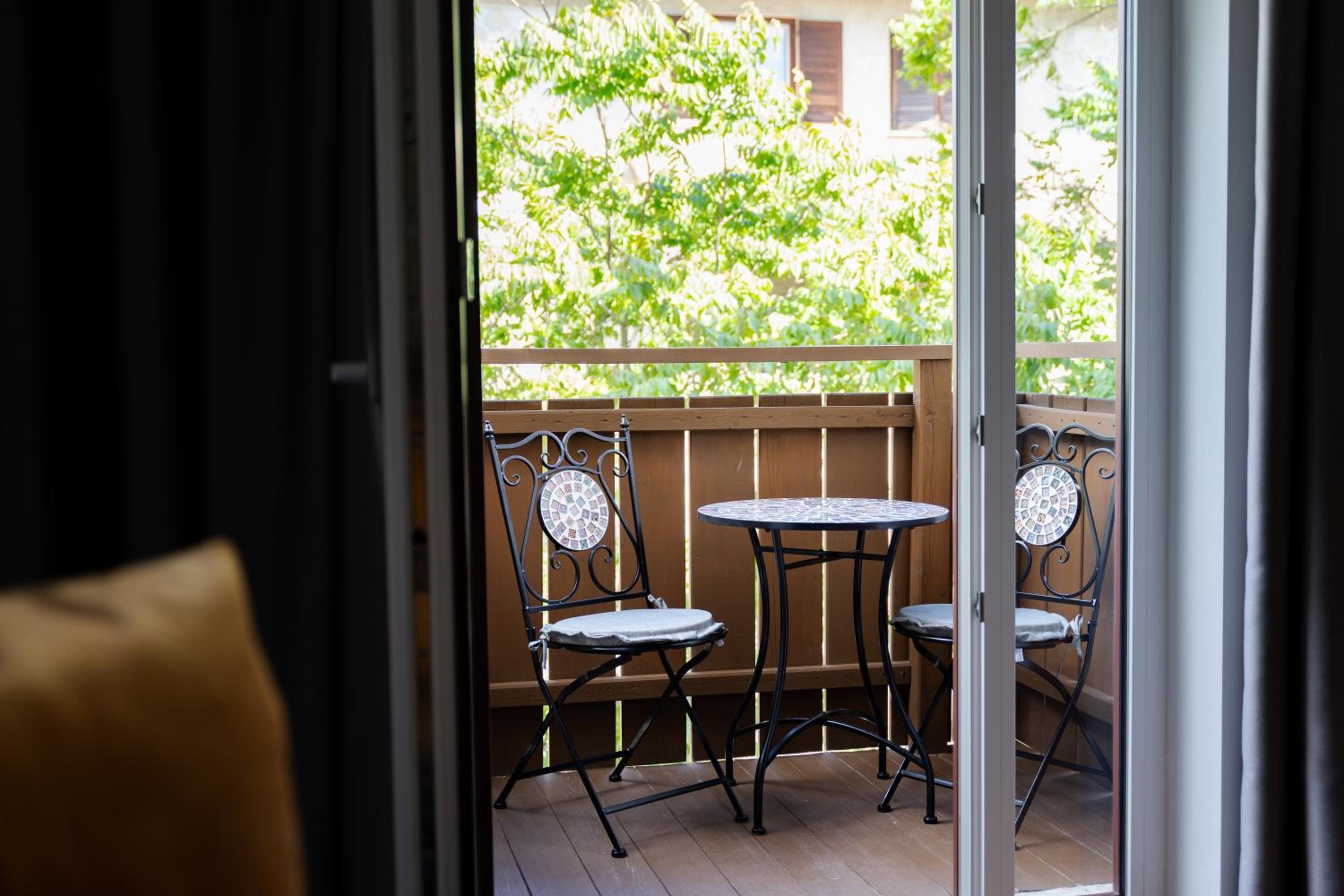 Quadruple Room with Balcony photo 3