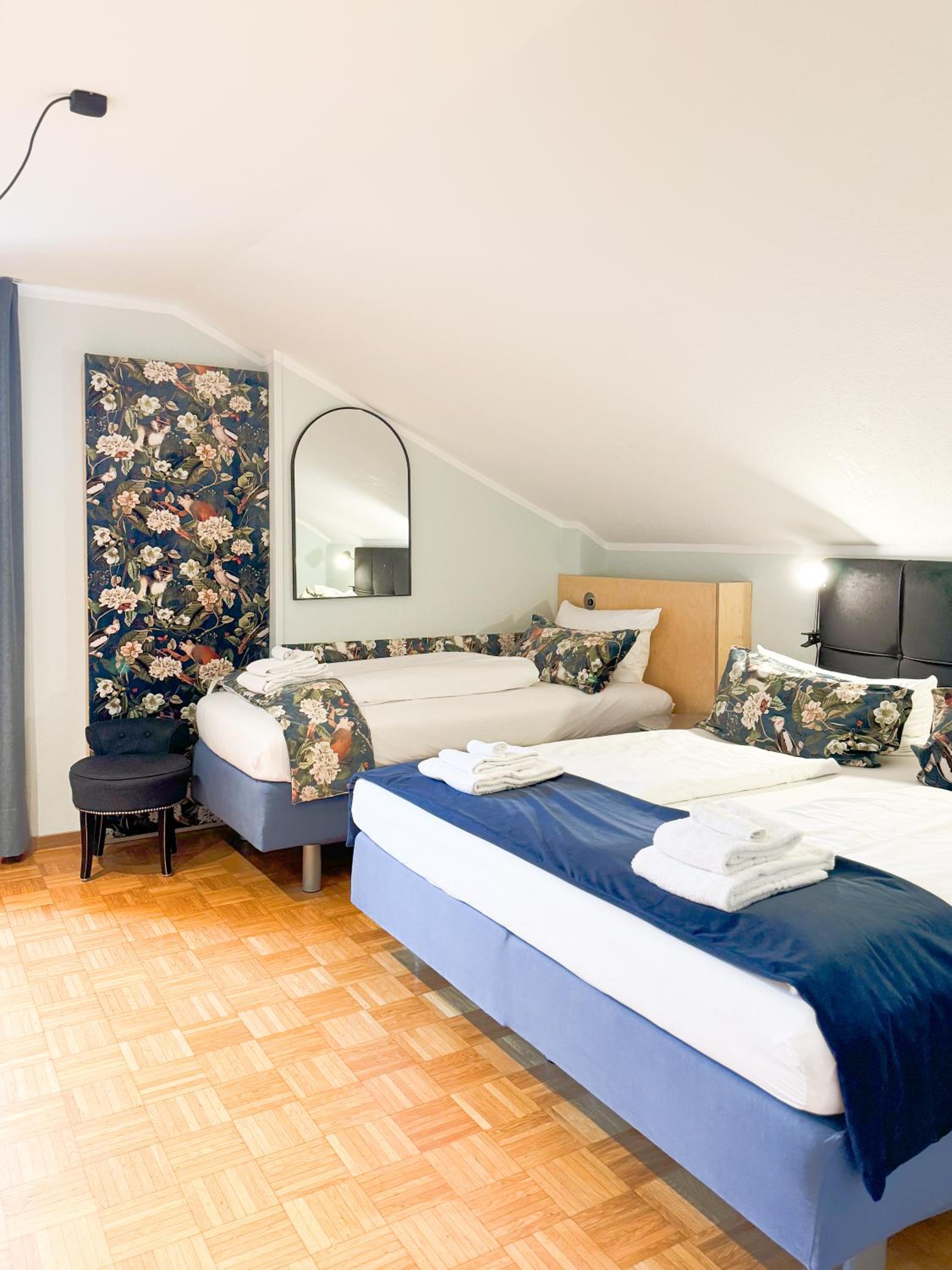 Triple Room with One Double Bed and One Single Bed - Photo 1