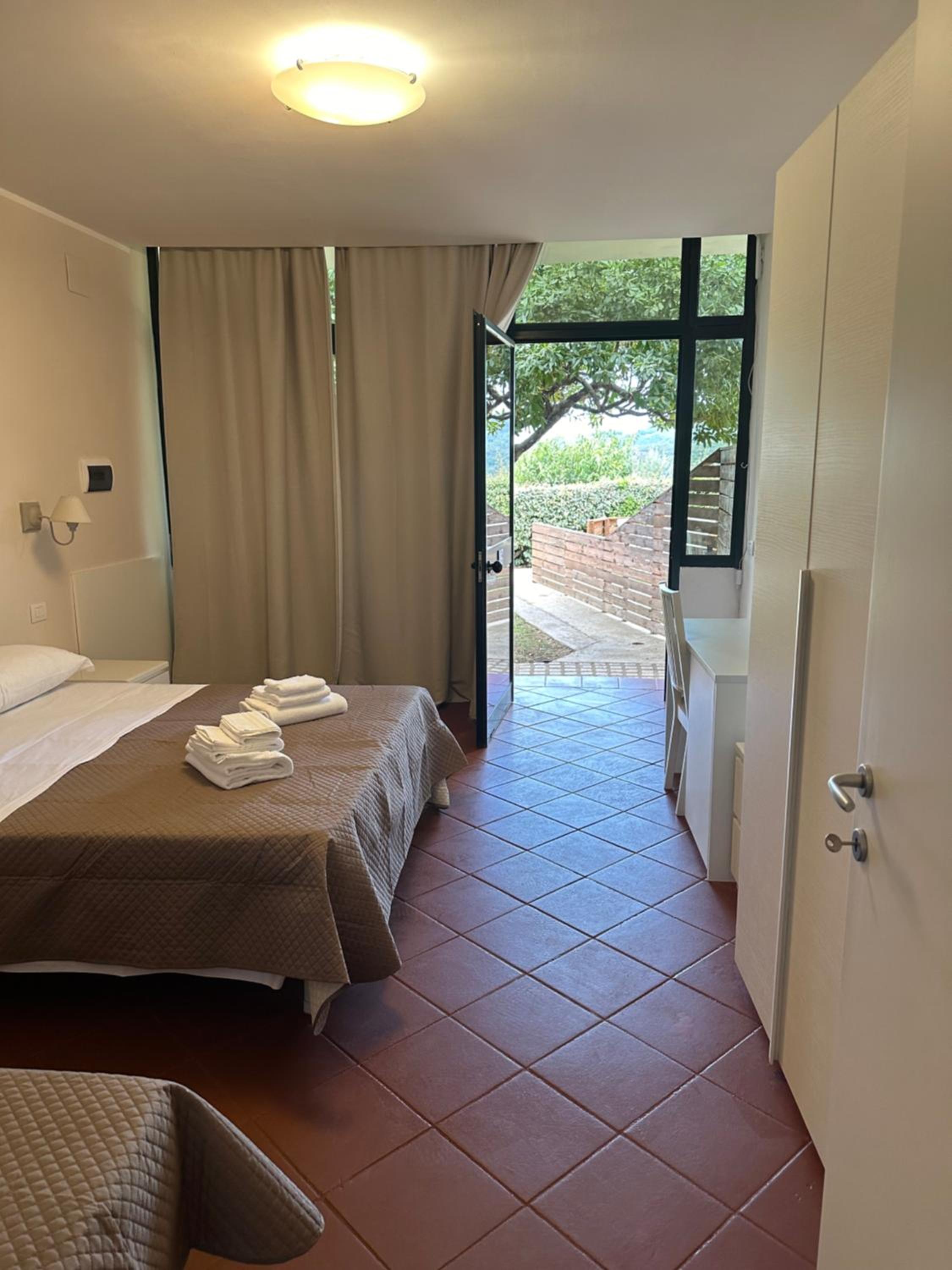 Quadruple Room with Garden View - Photo 1