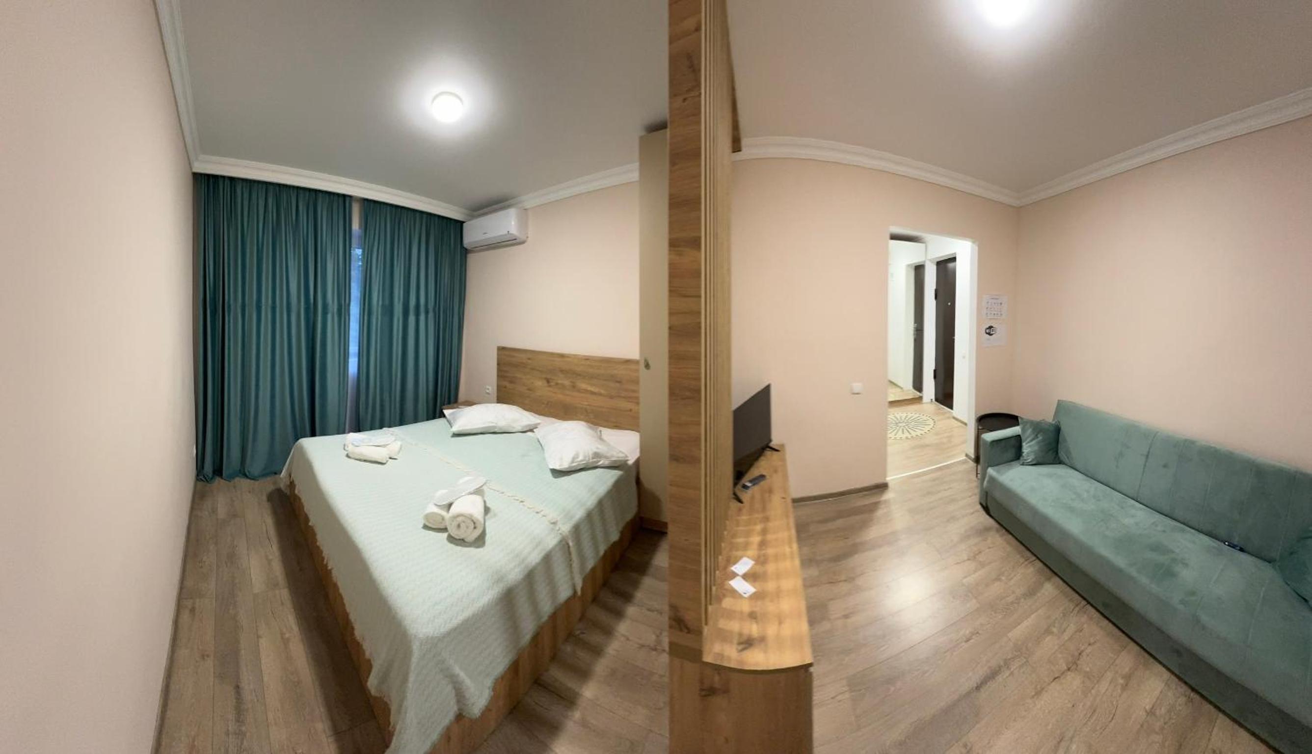 Double Room with Balcony (2 Adults + 1 Child) photo 1
