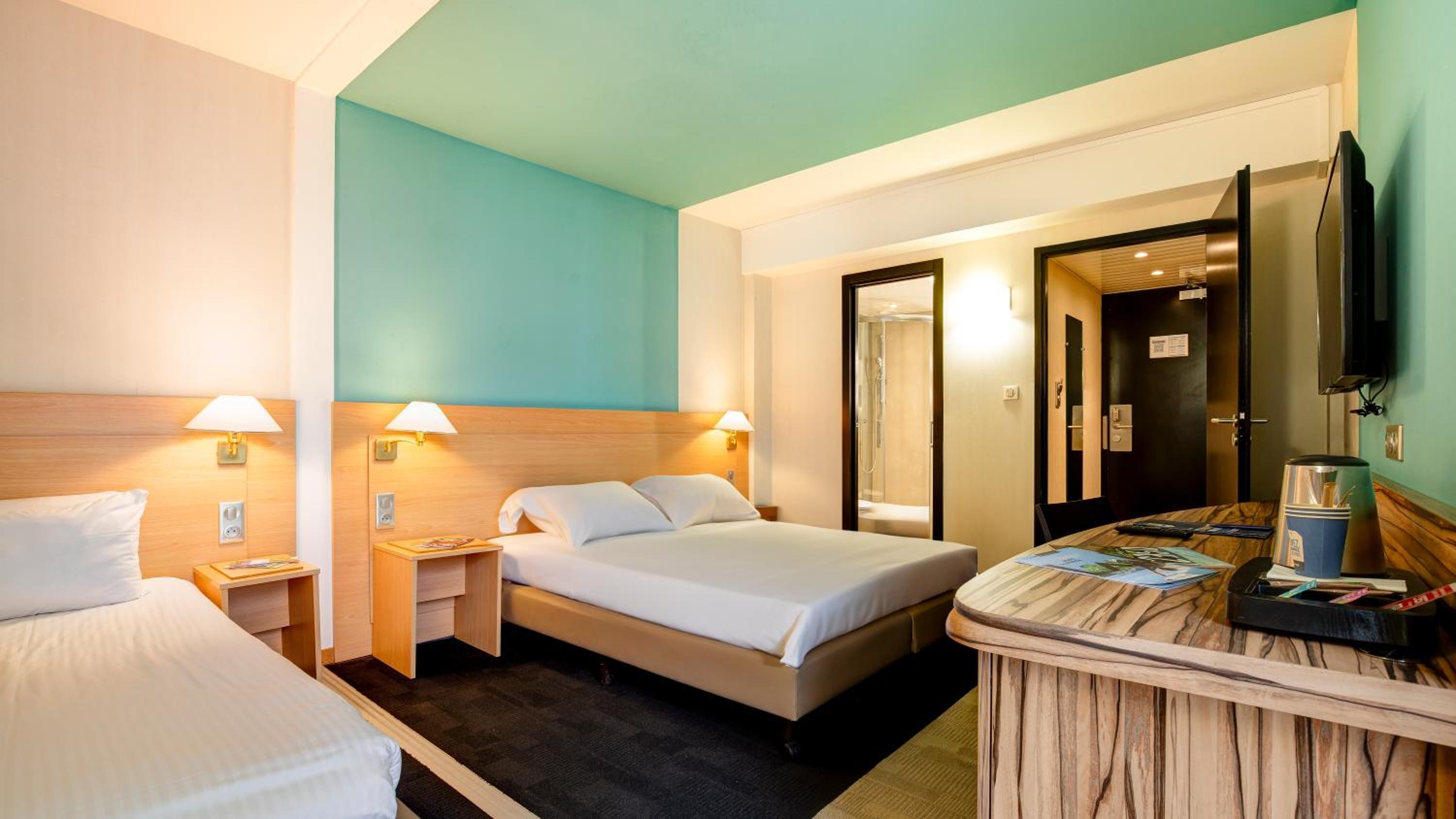 Triple Room (1 Double Bed + 1 Single Bed)