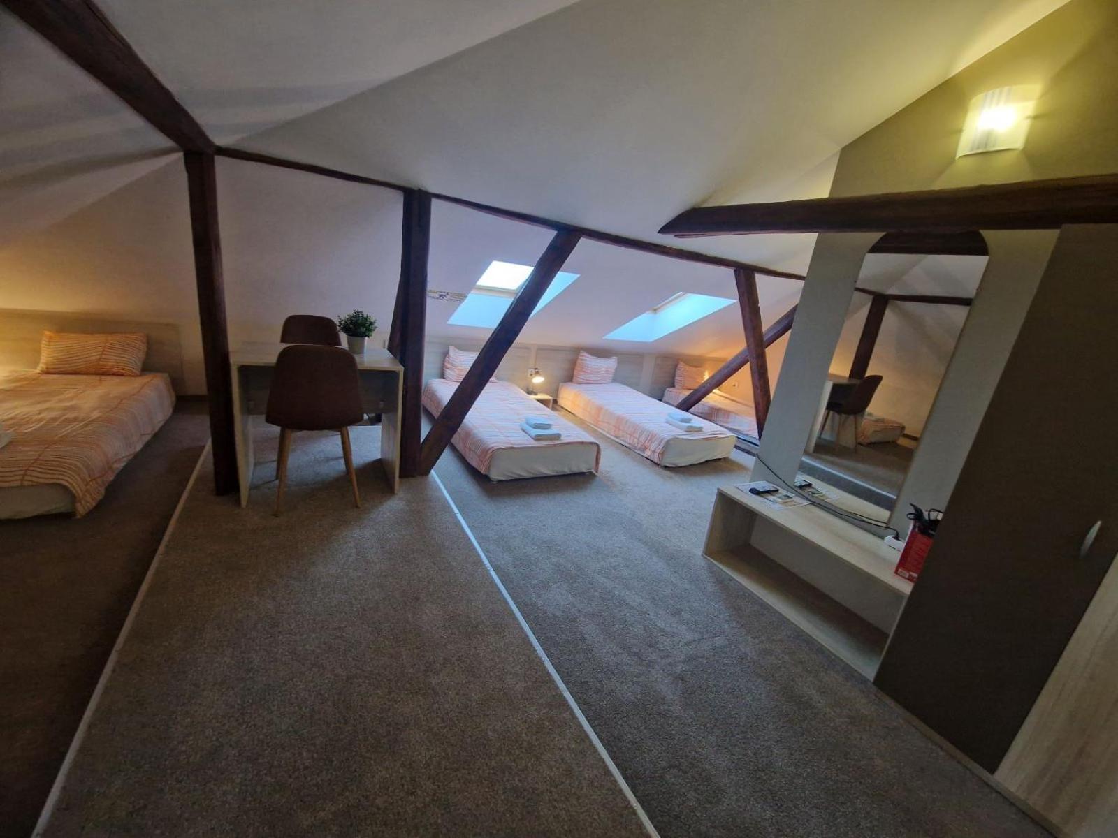 Quadruple Room with Private Bathroom - Photo 1