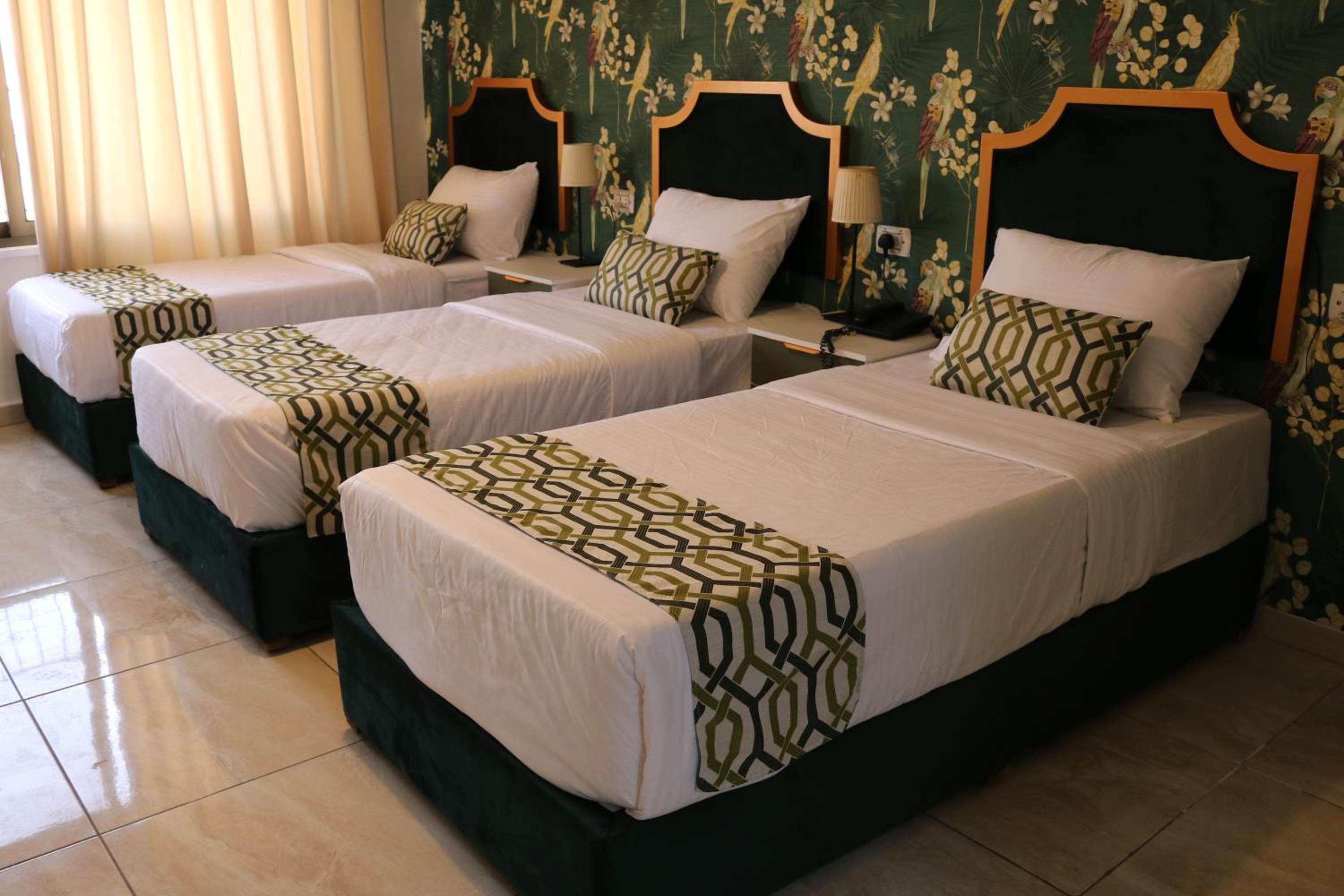Deluxe Triple Room
