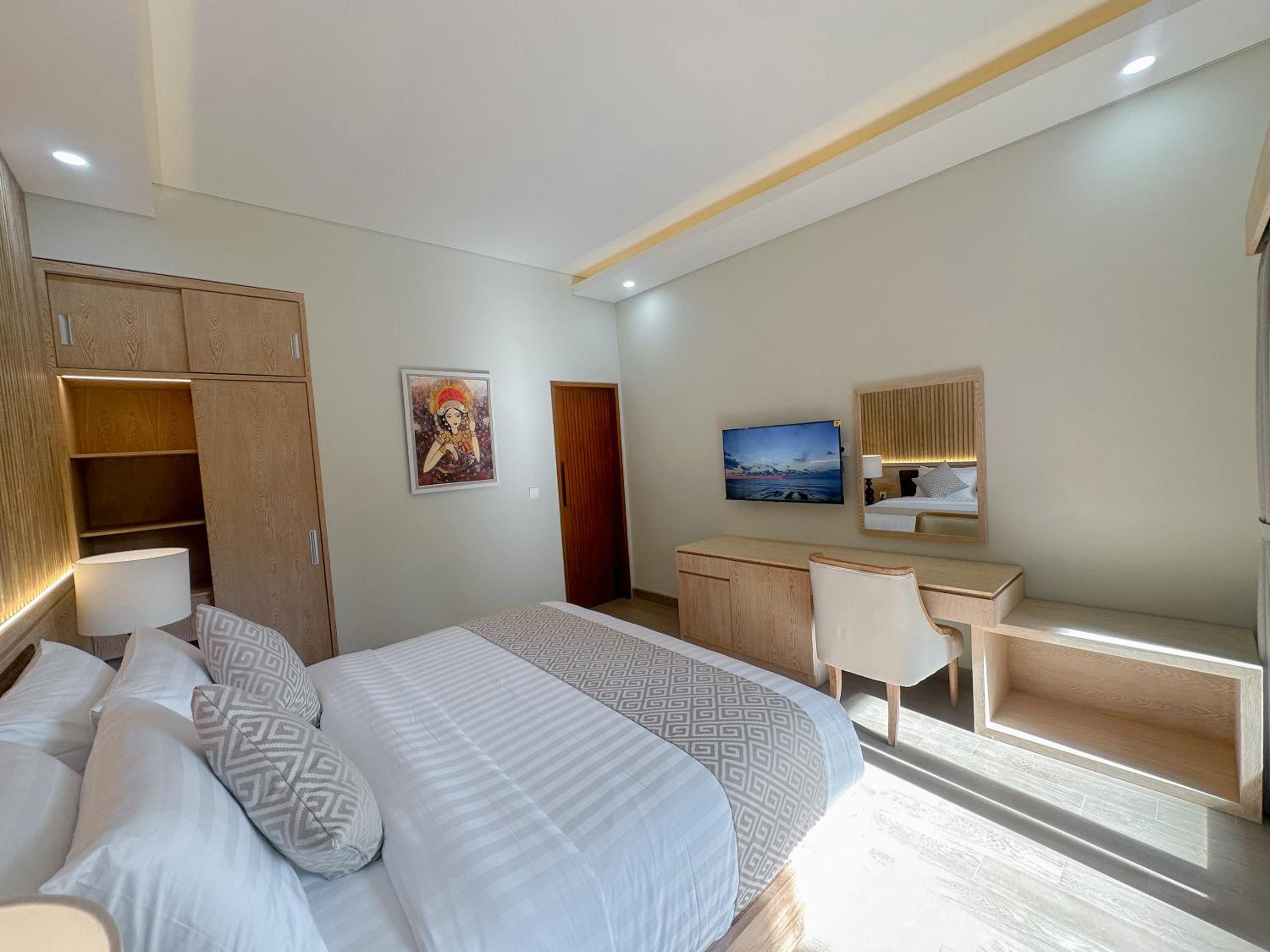 Deluxe King Room - Photo 7