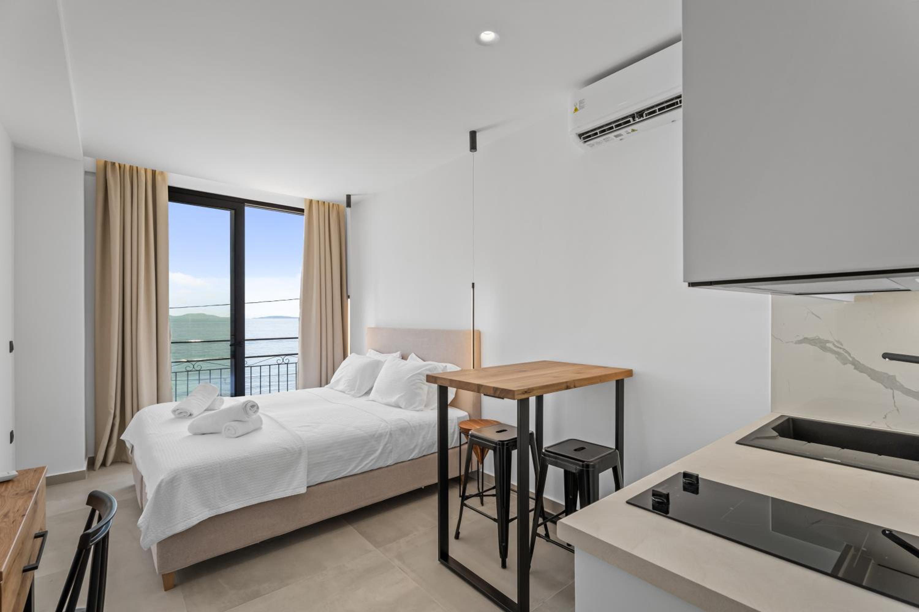 One-Bedroom Apartment with Balcony and Sea View