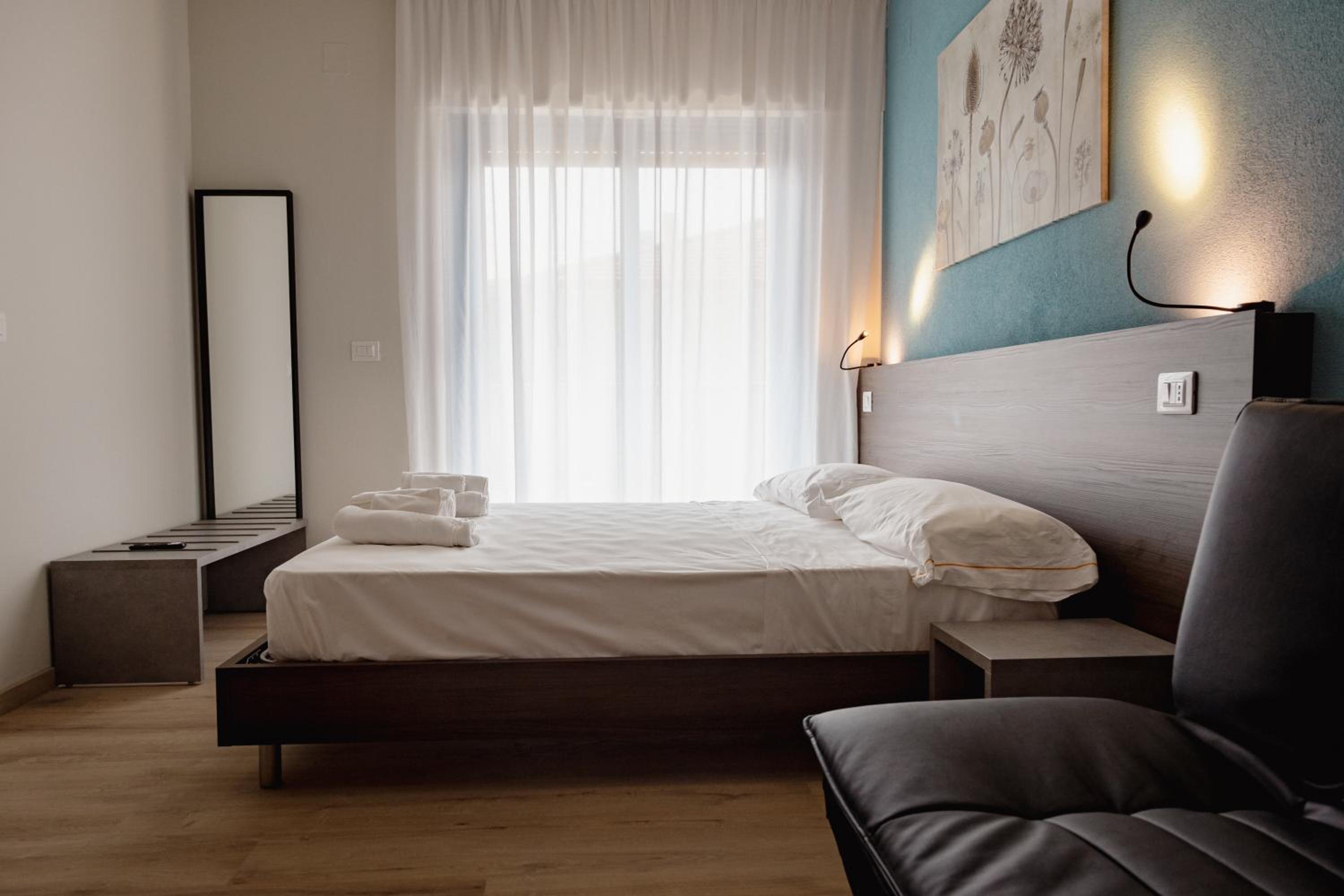 Quarto Triplo com Varanda.