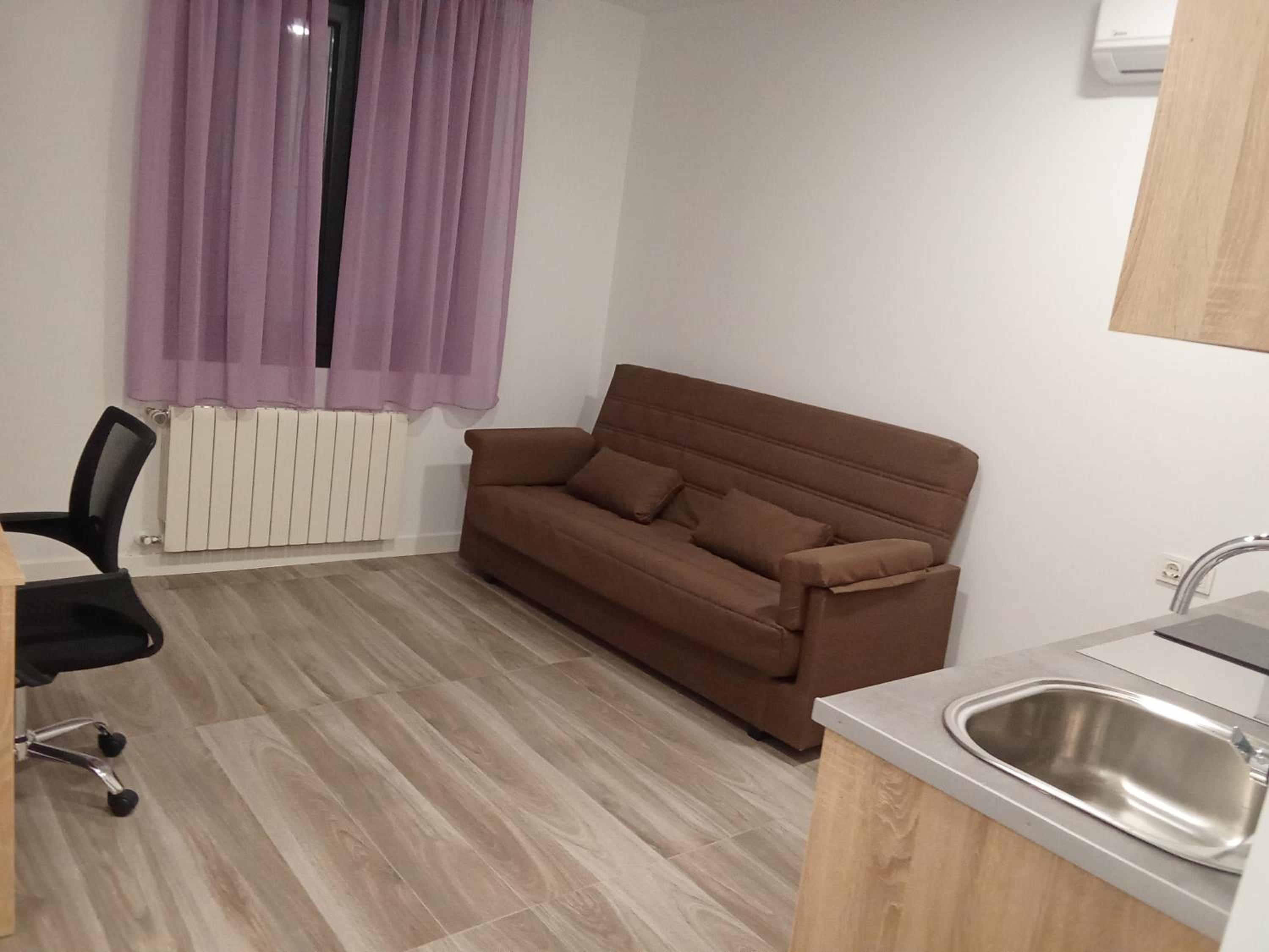 Estudio con sofá cama