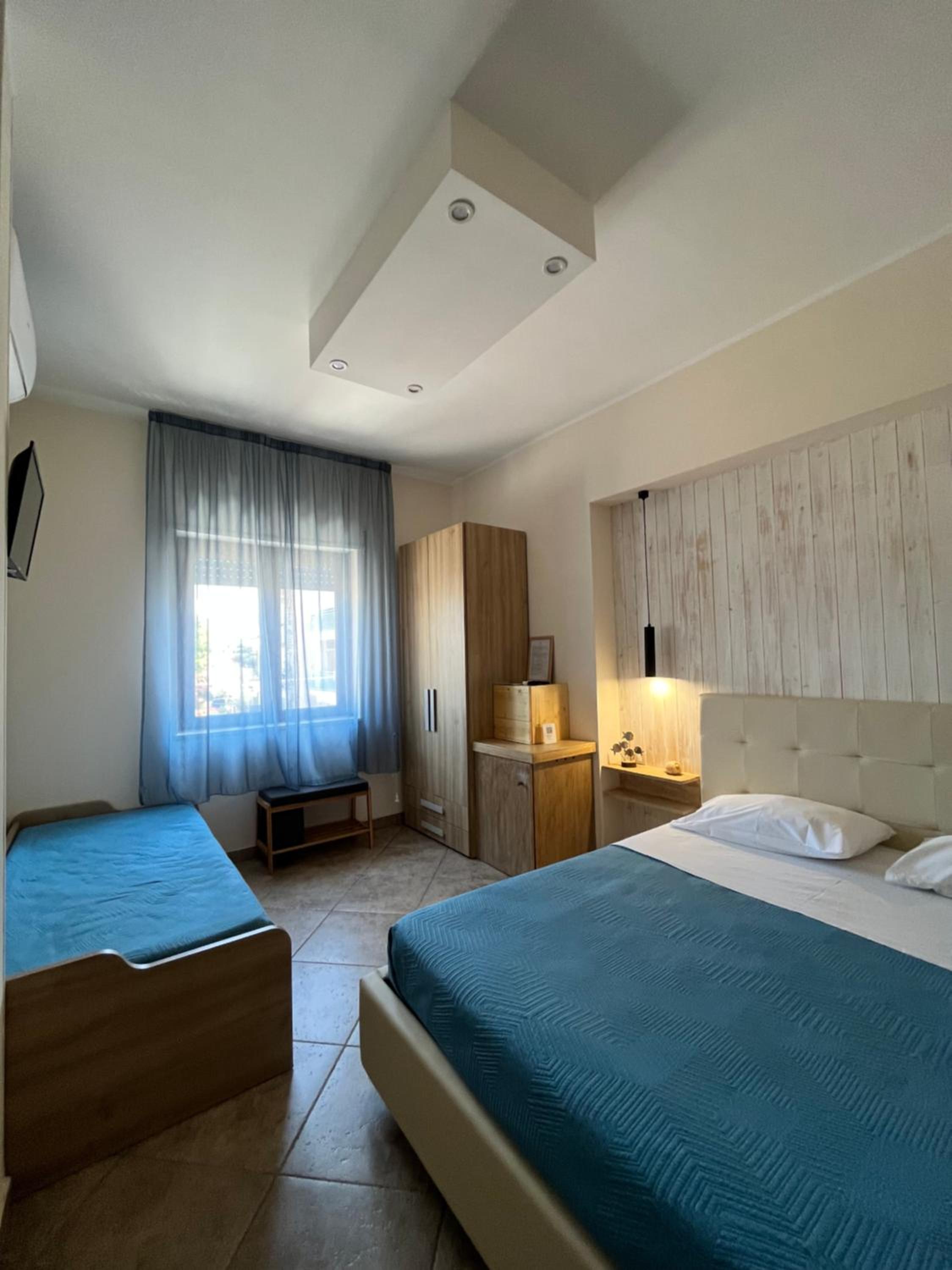 Triple Room with Private Bathroom photo 3