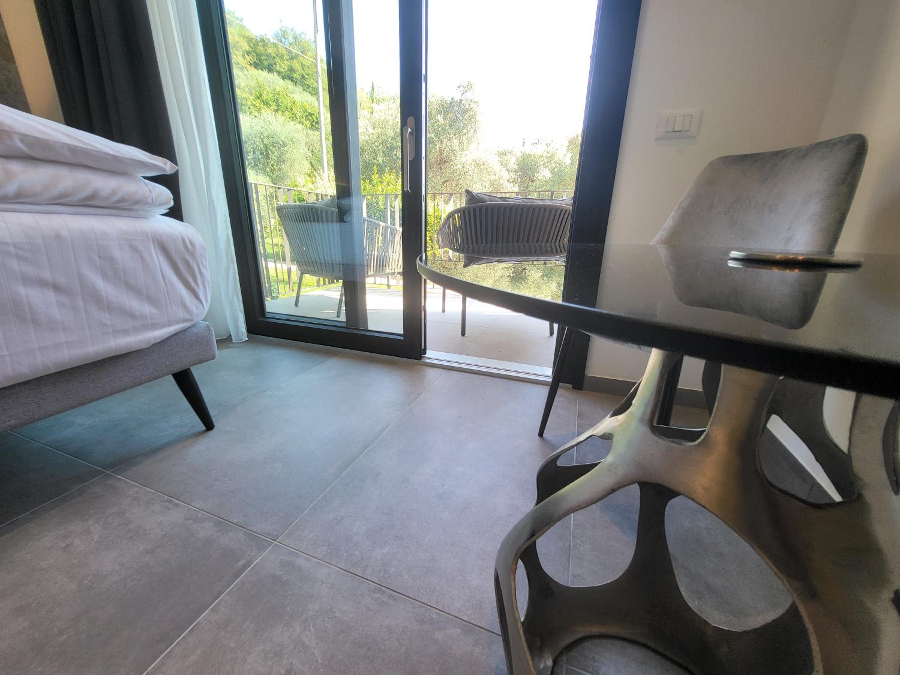 King Suite with Side Lake View and Balcony photo 1