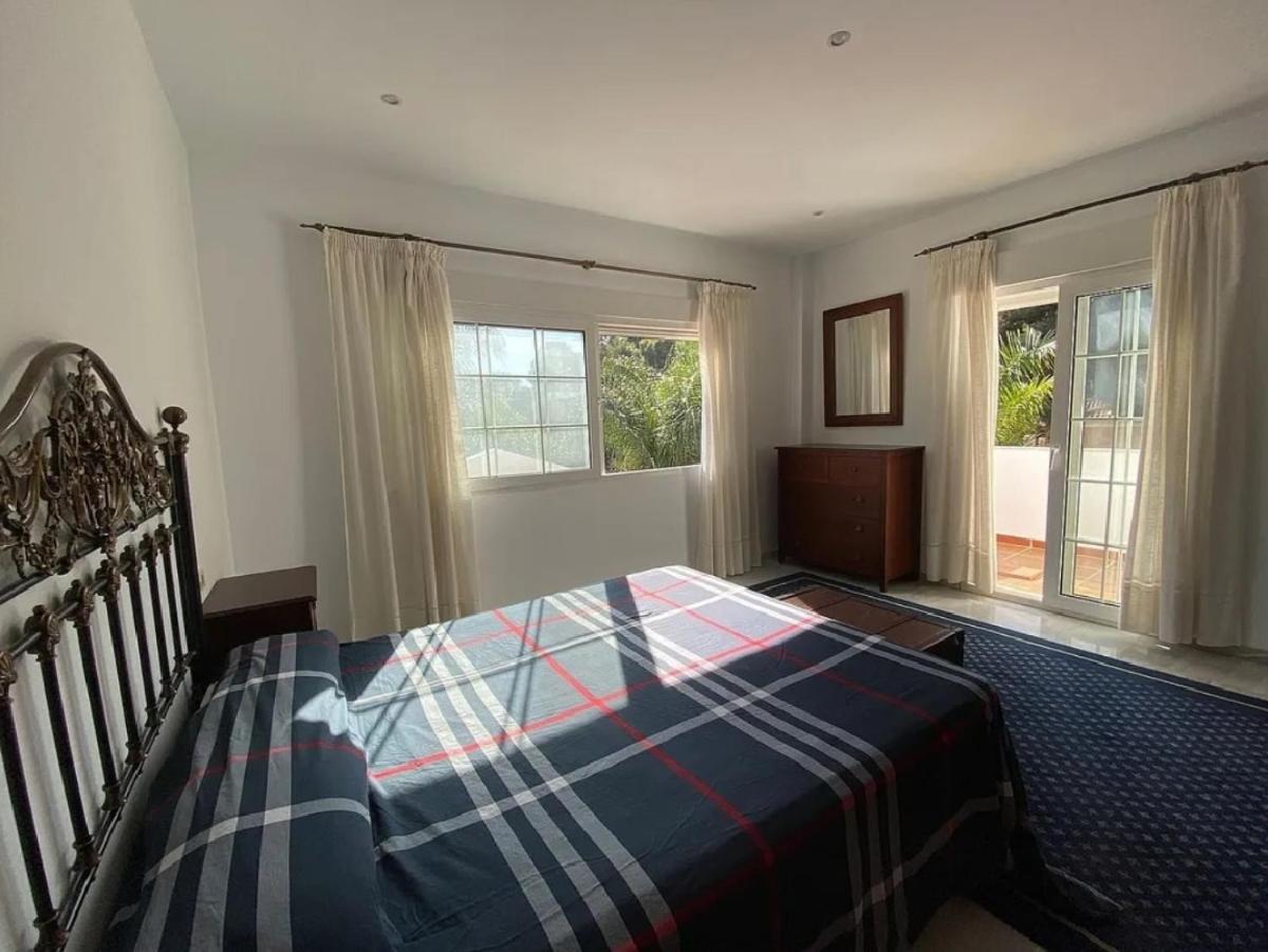 Three-Bedroom House photo 1