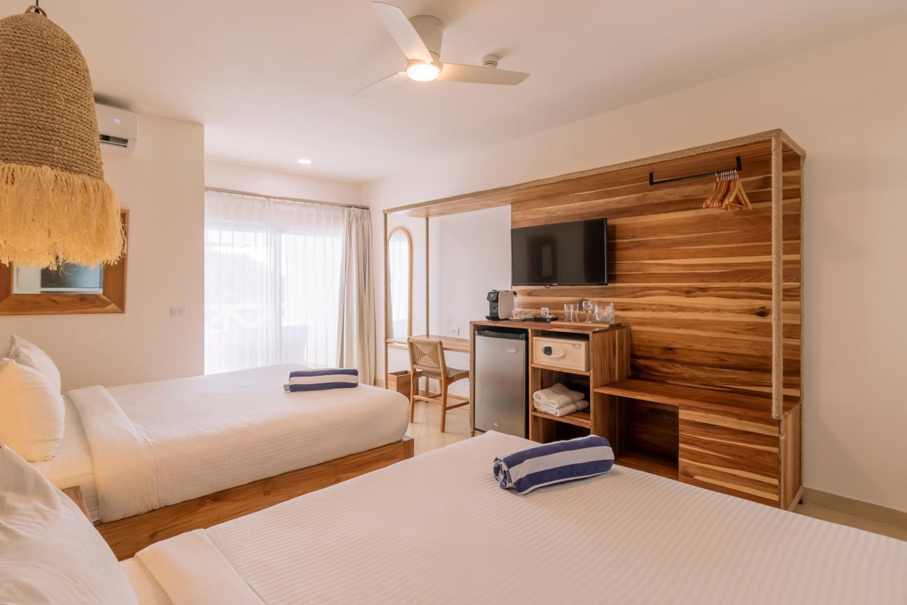 Deluxe 2 Queen with Balcony partial Ocean View