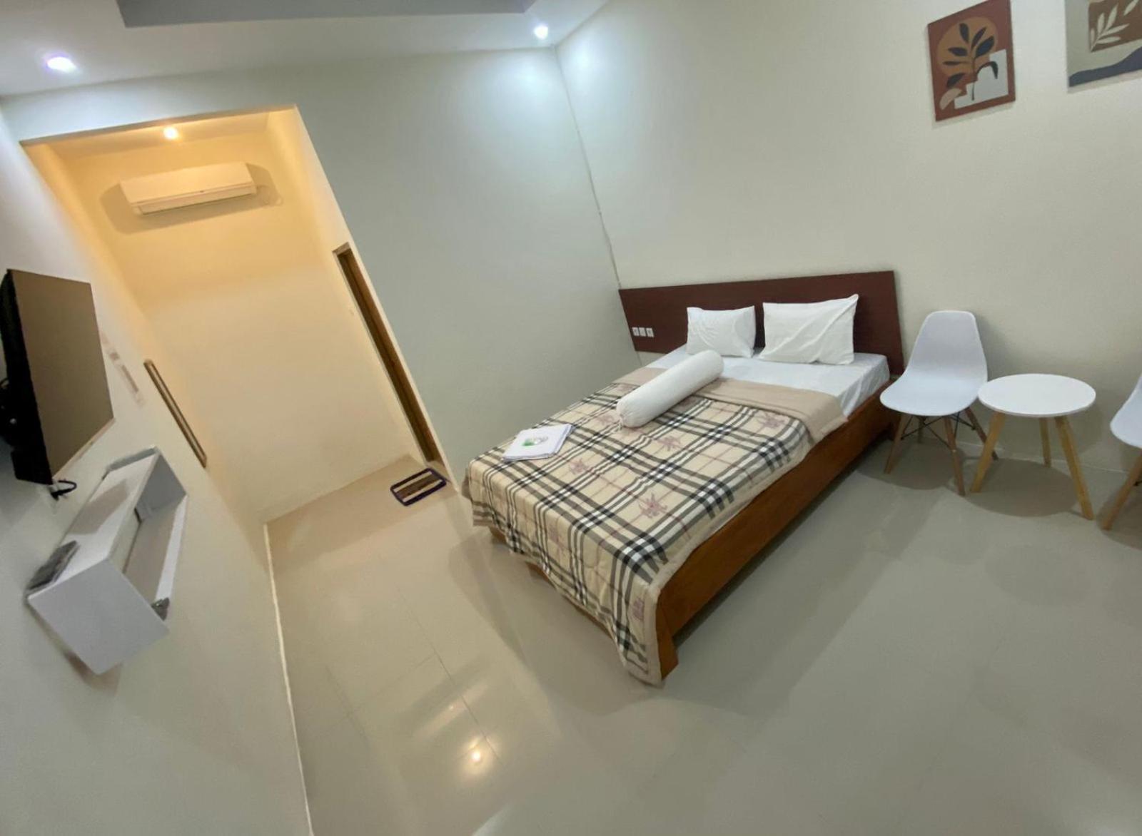 Deluxe Room (2 Adults + 1 Child) - Photo 1