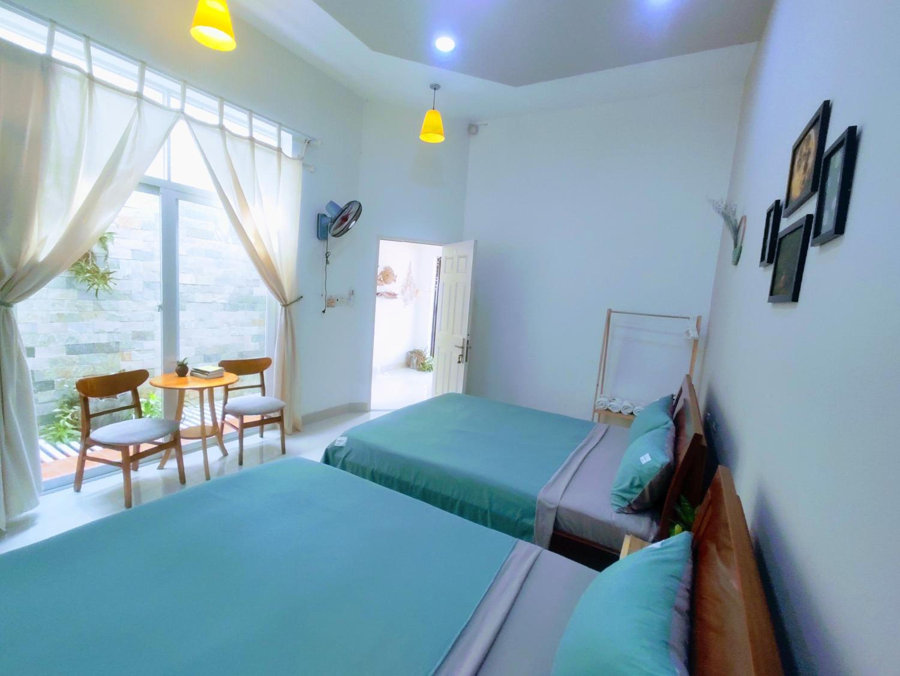 Deluxe Queen Room with Two Queen Beds photo 1