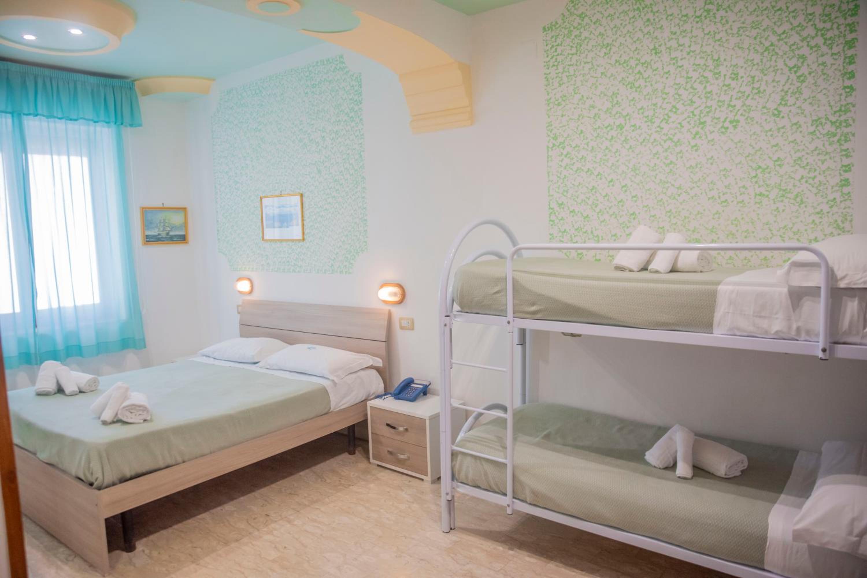Quadruple Room with Balcony photo 1