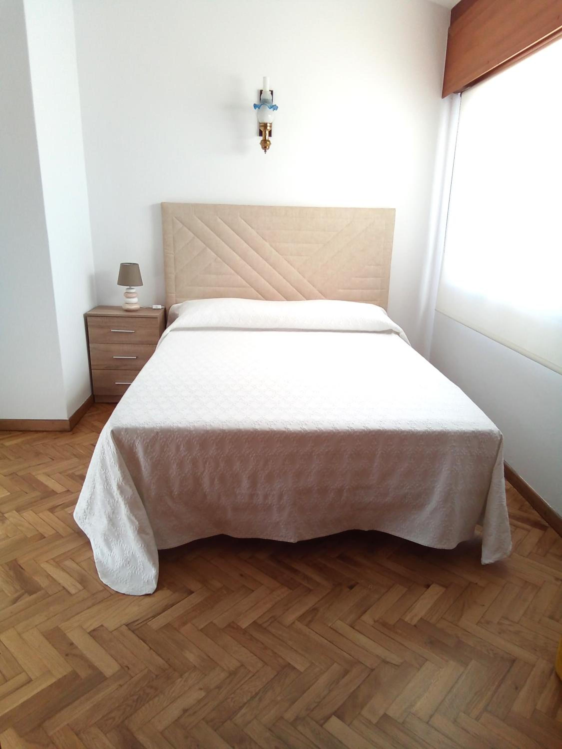 Habitación Queen con Baño Compartido