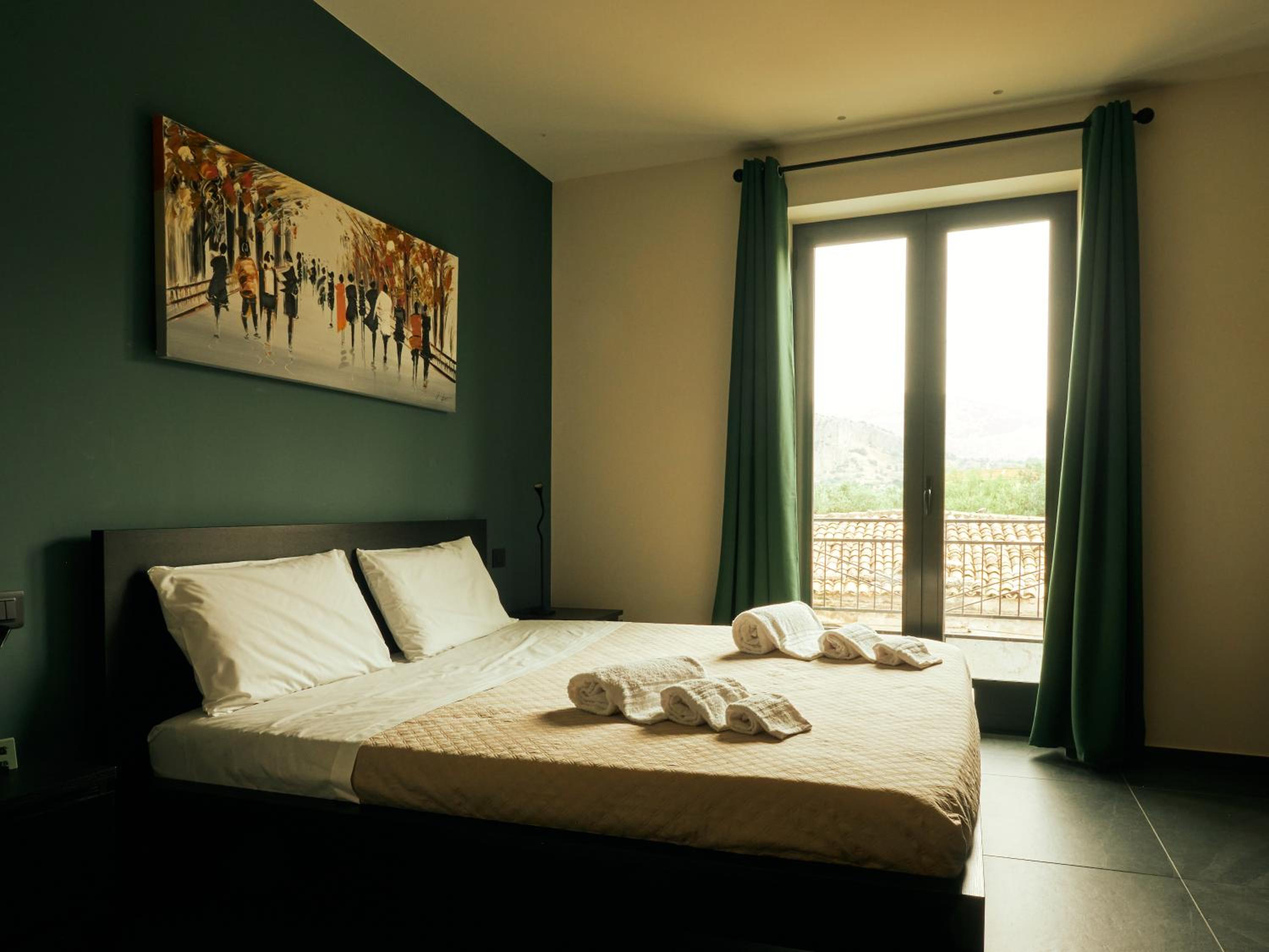 Double Room with Balcony (2 Adults + 1 Child) photo 1