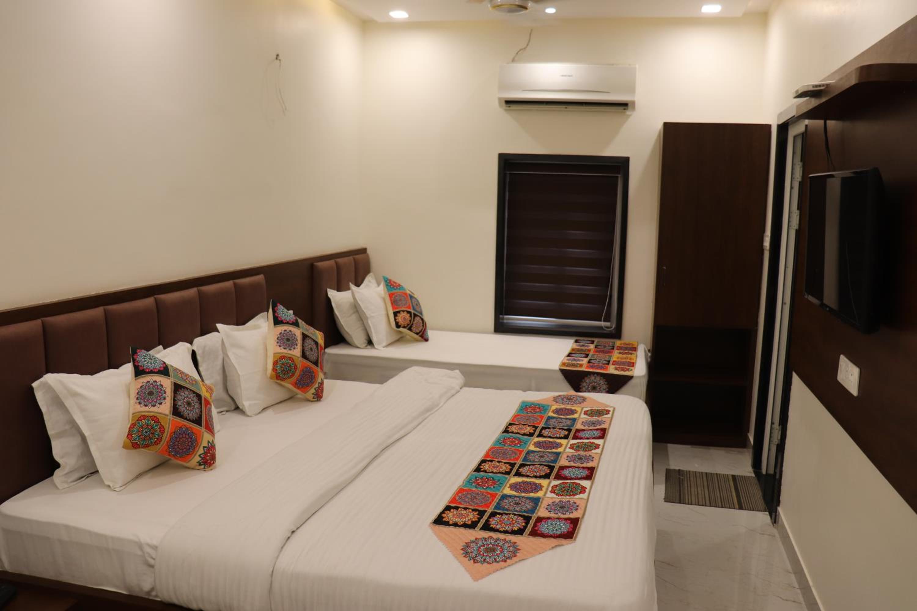 Deluxe Triple Room - Photo 1