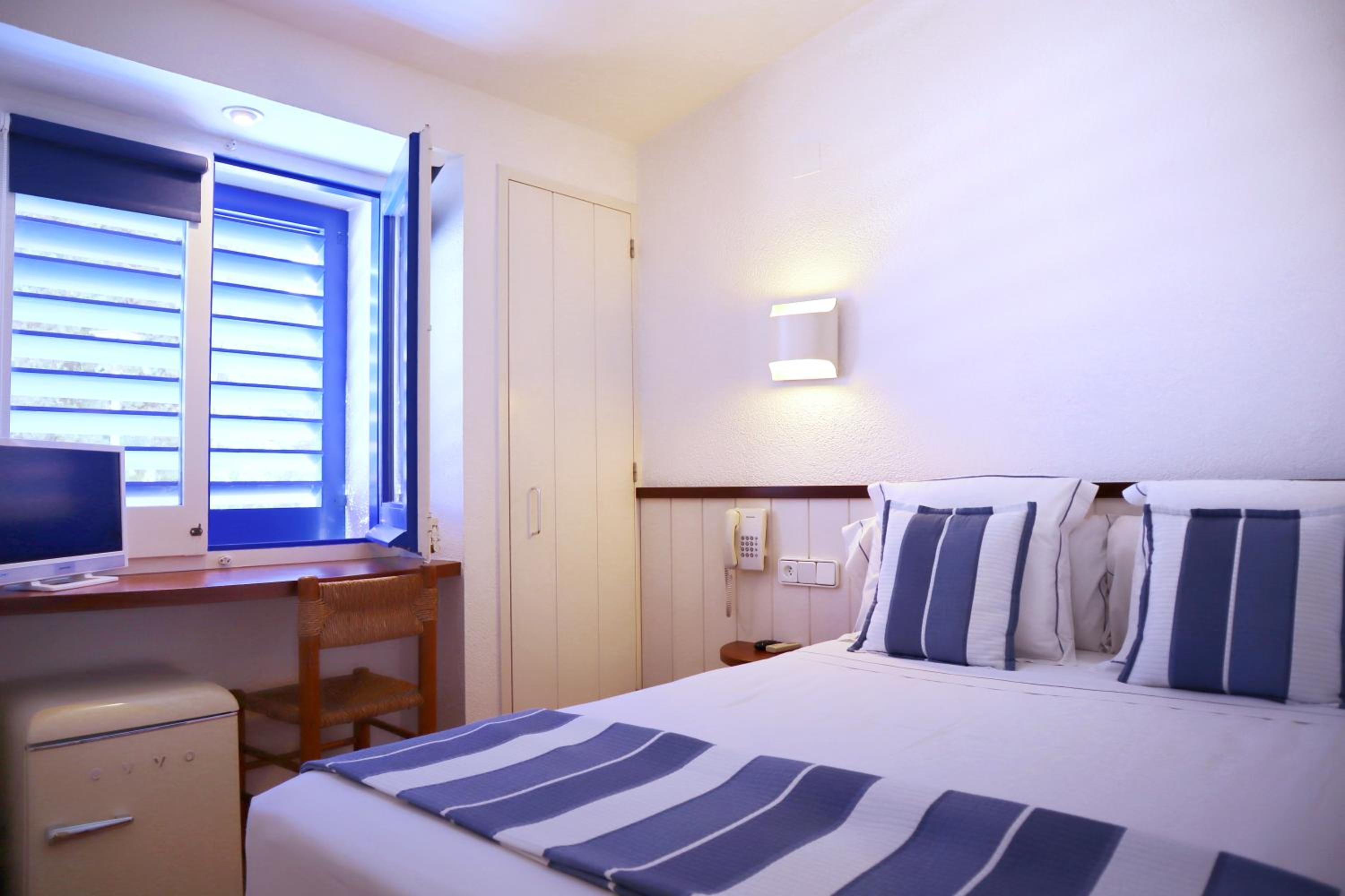 Habitación Estándar con Cama Queen