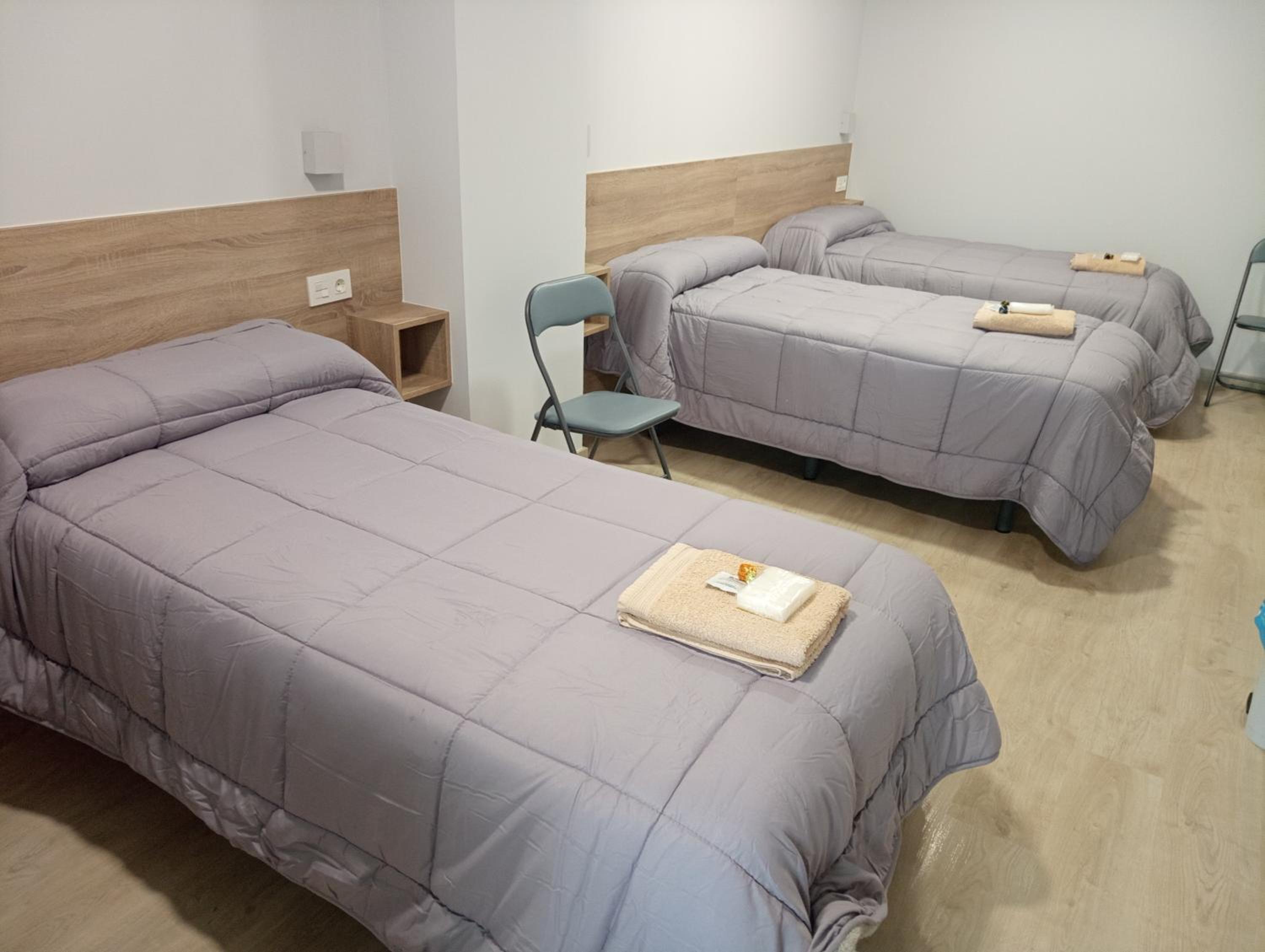 Habitación triple con baño
