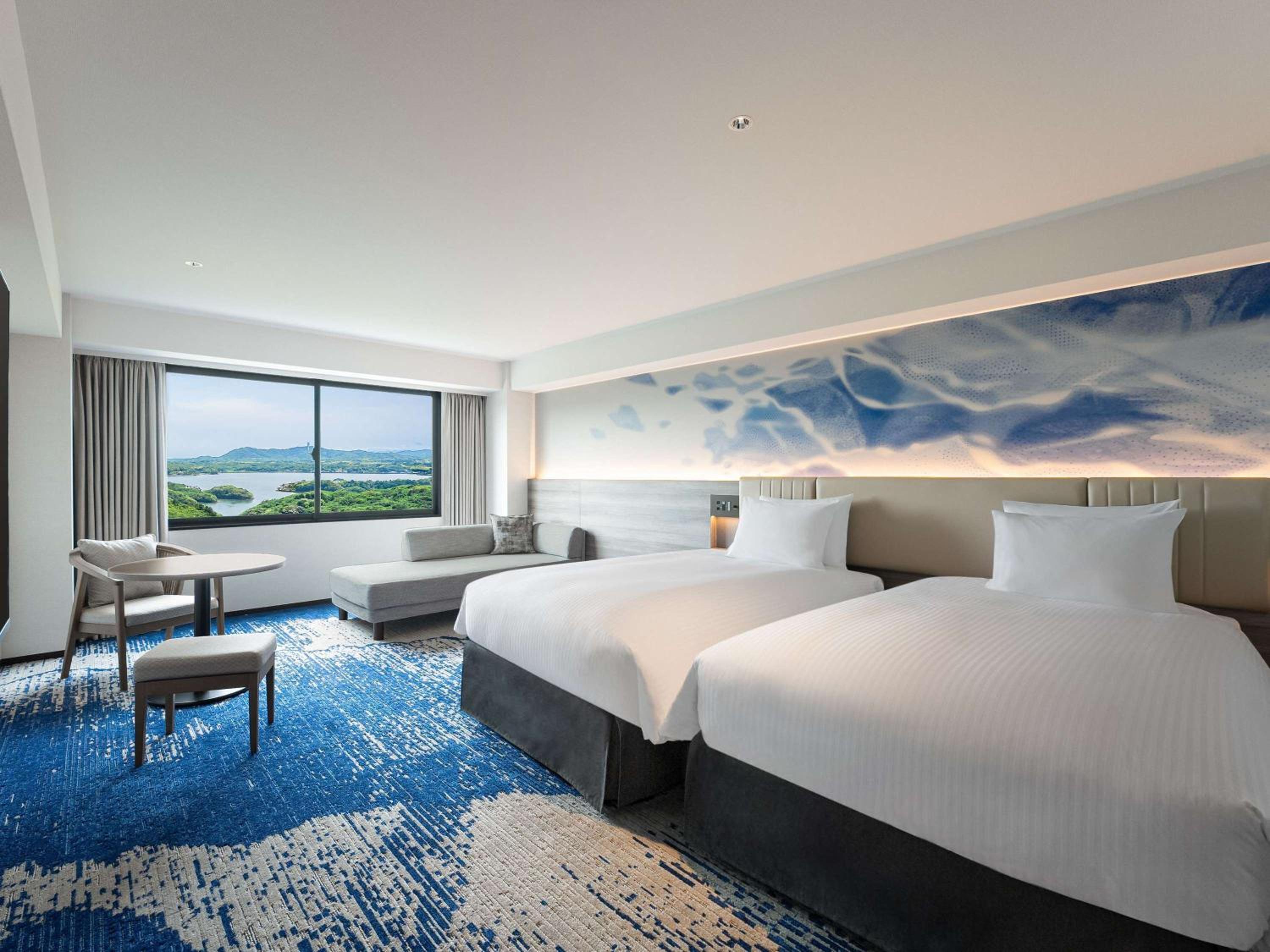 Superior Room with Two Single Beds and Two Extra Beds - Mountain View