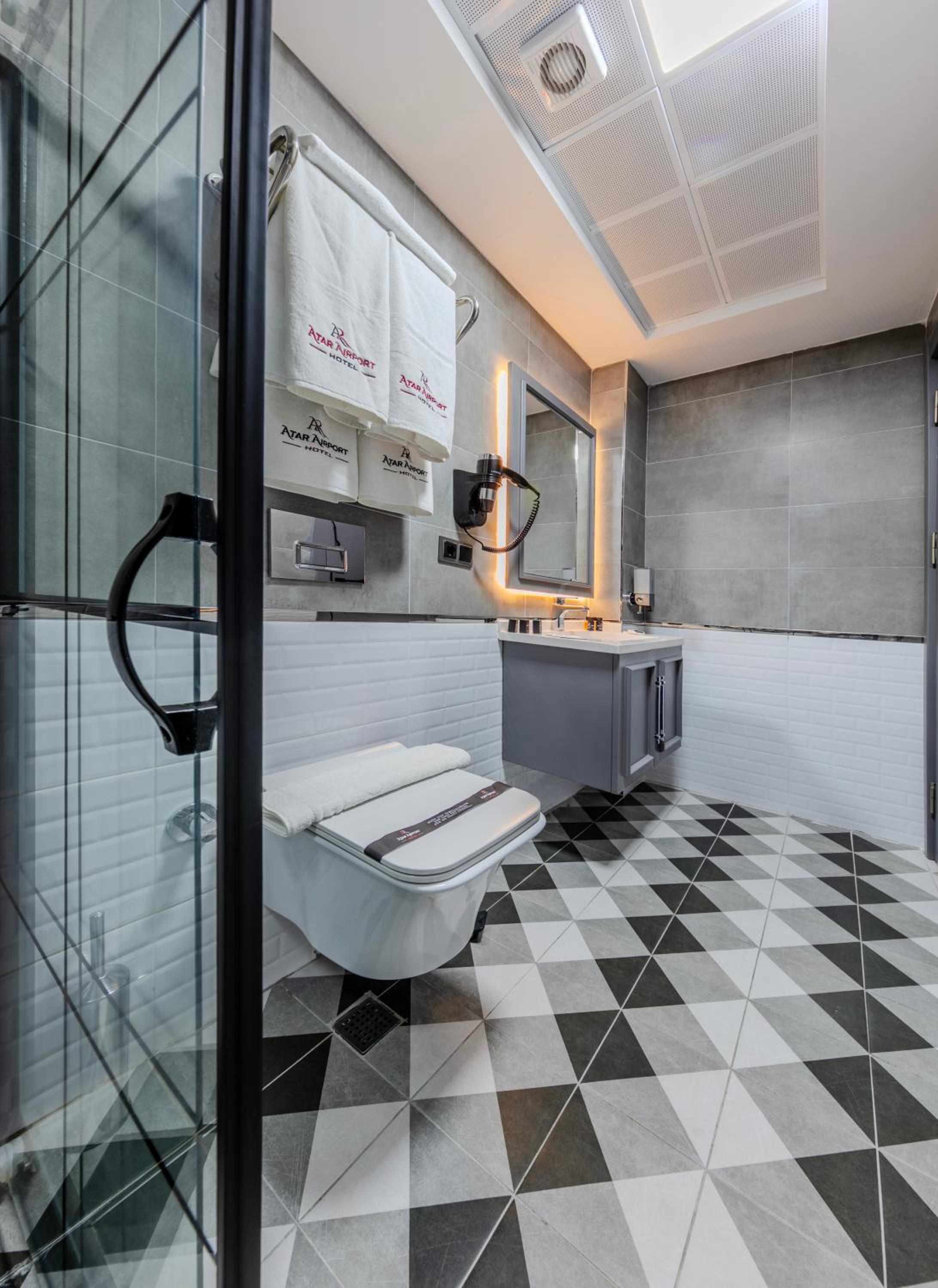 Deluxe Triple Room - Photo 7