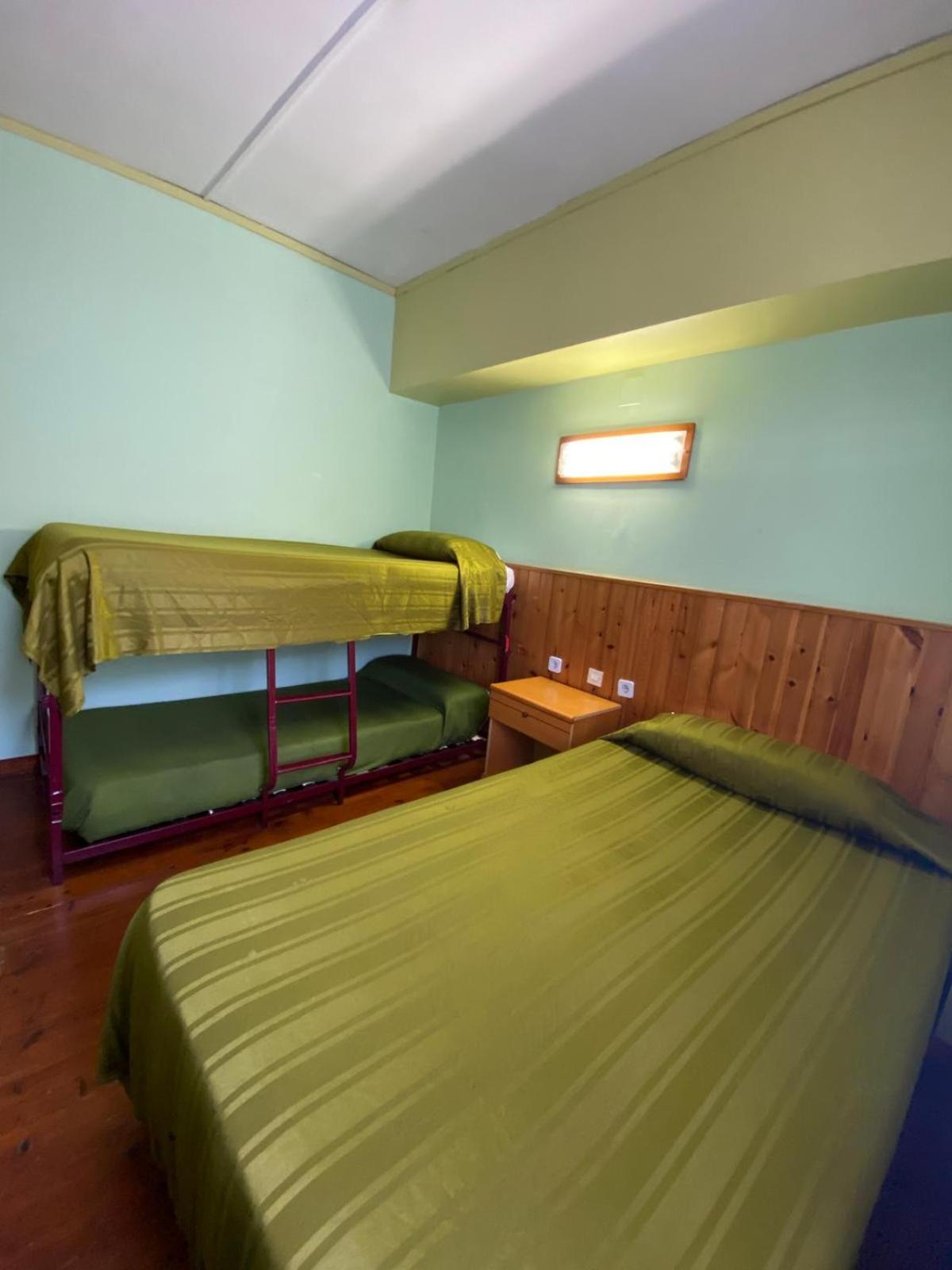 Economy Quadruple Room - Photo 8