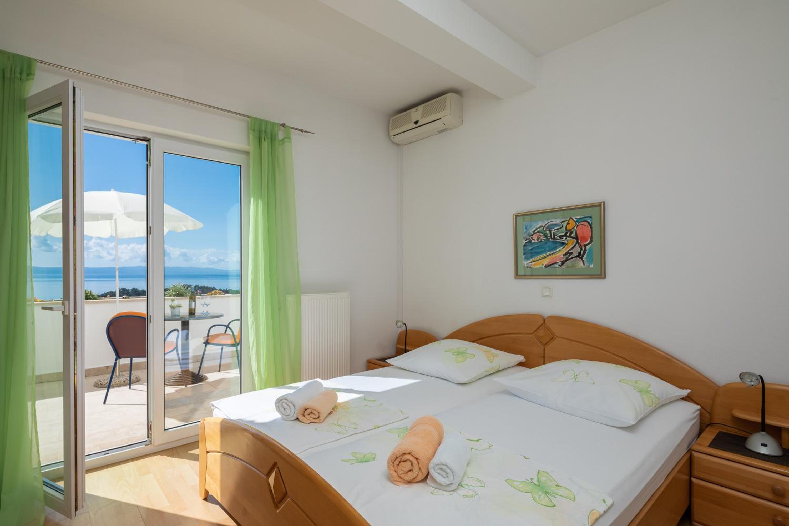 Quarto Duplo com Varanda e Vista para o Mar