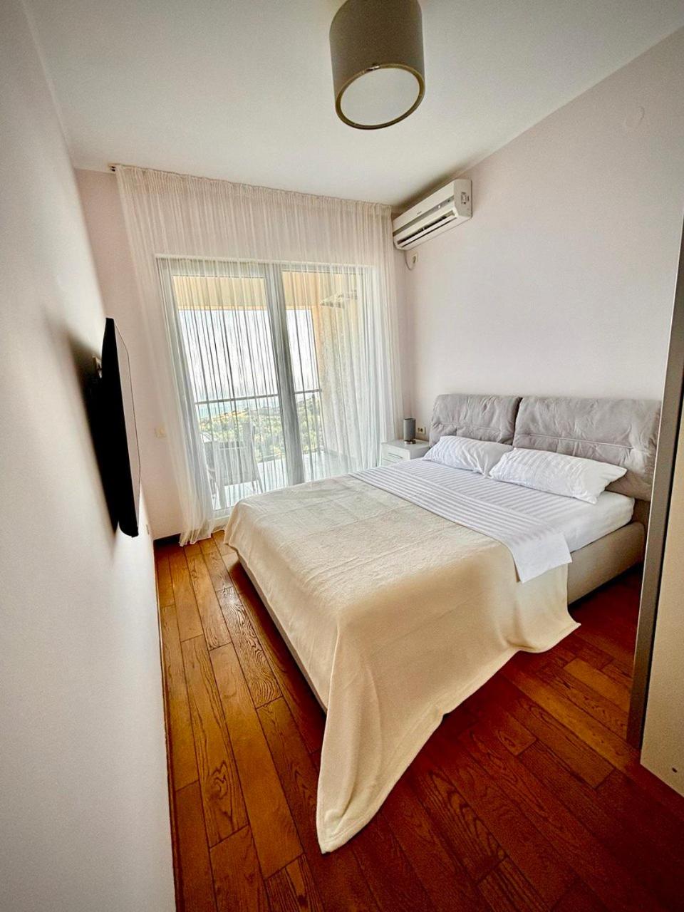 Two-Bedroom Apartment with Balcony and Sea View