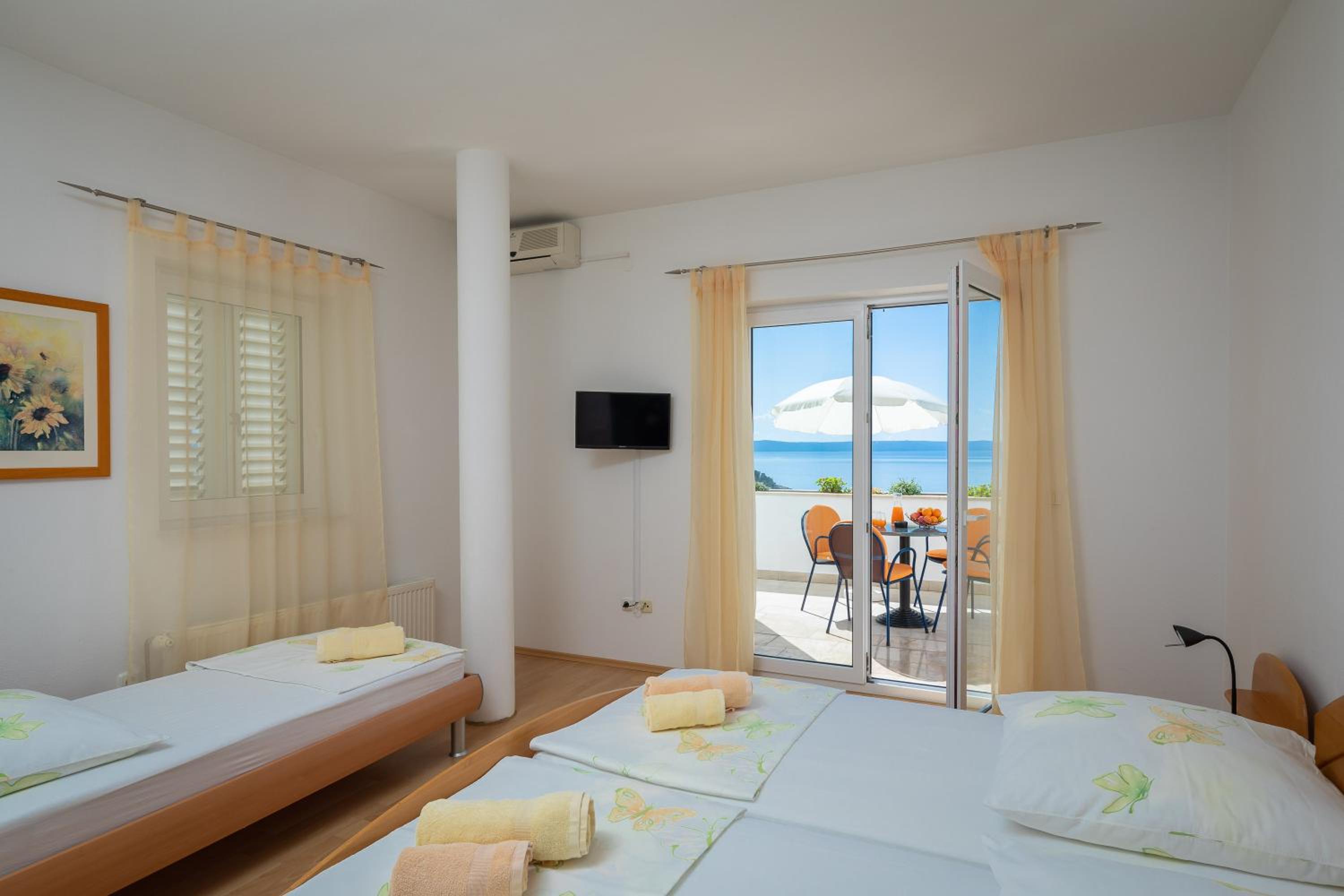 Quarto Triplo Deluxe com Vista para o Mar