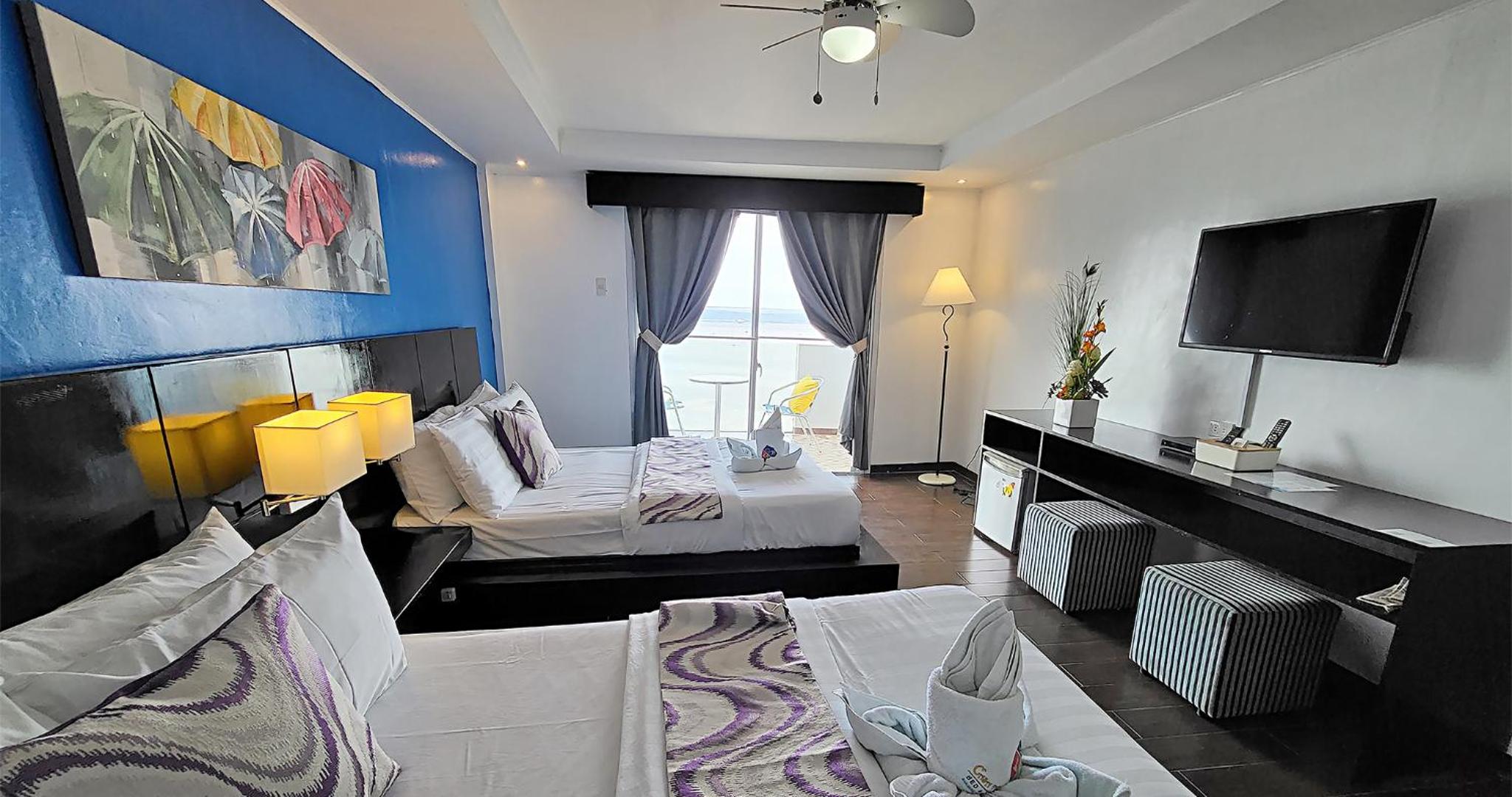 Deluxe Queen Room with Two Queen Beds - Photo 7