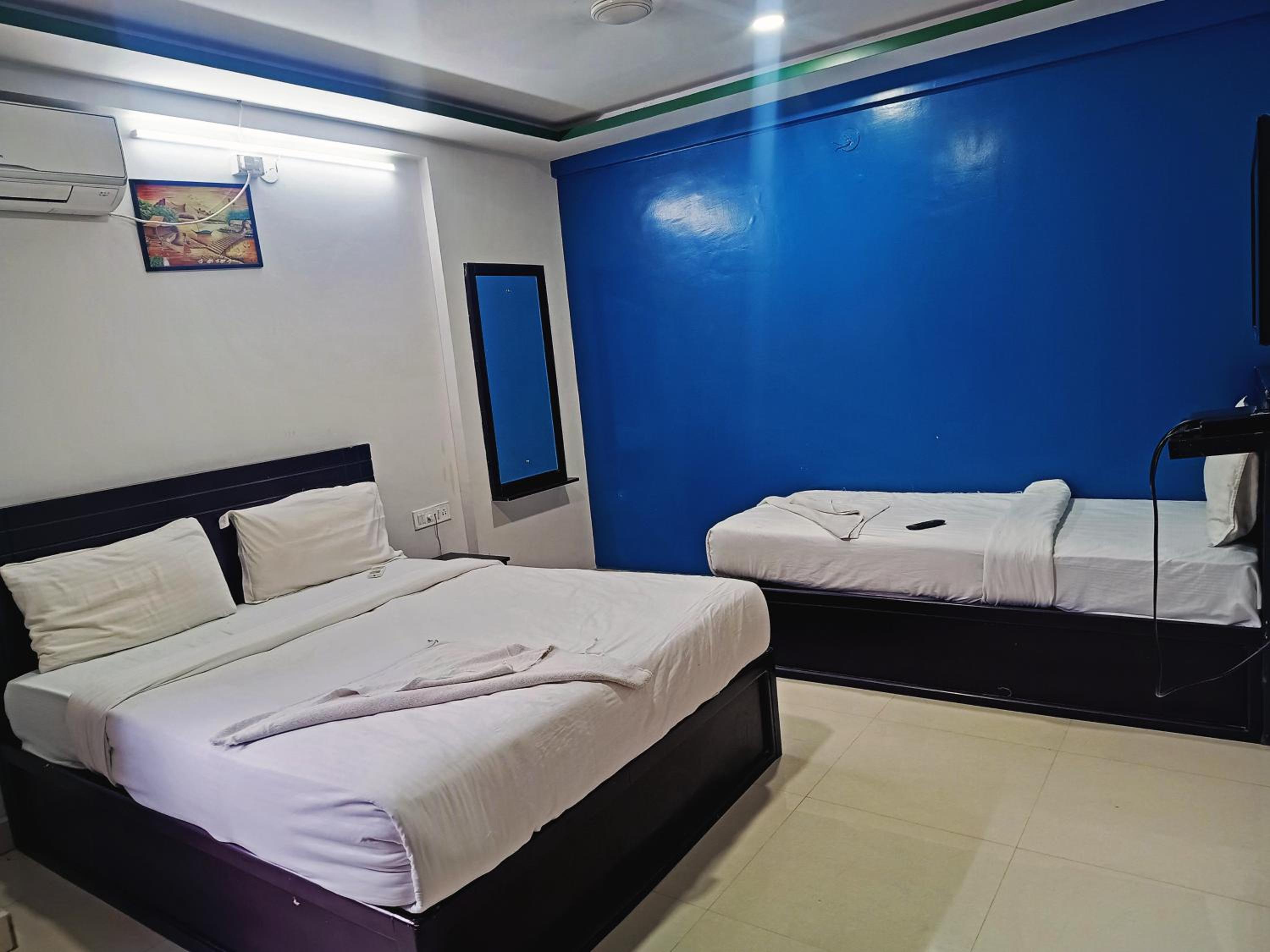 Deluxe Triple Room - Photo 1