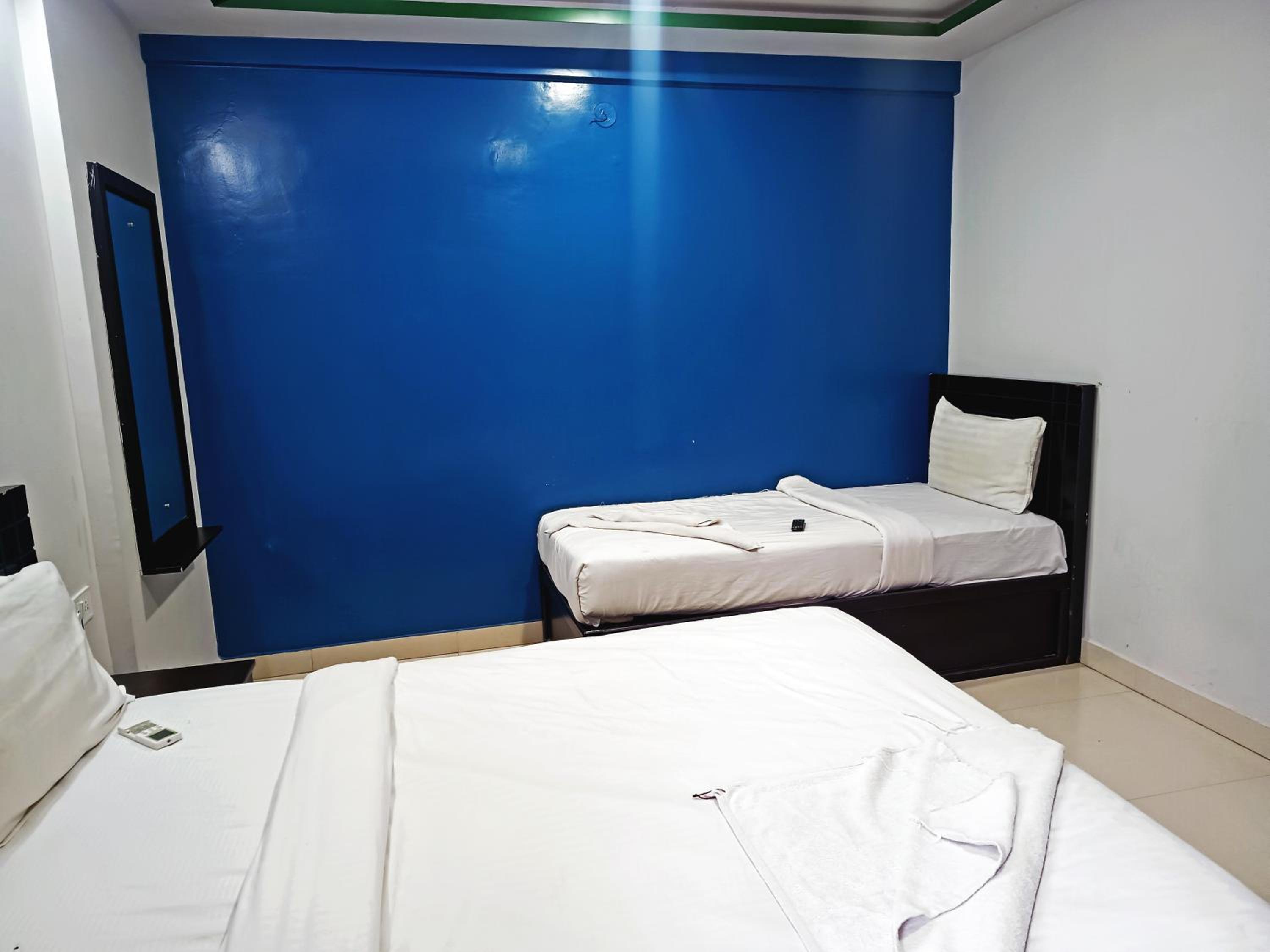 Deluxe Triple Room - Photo 5