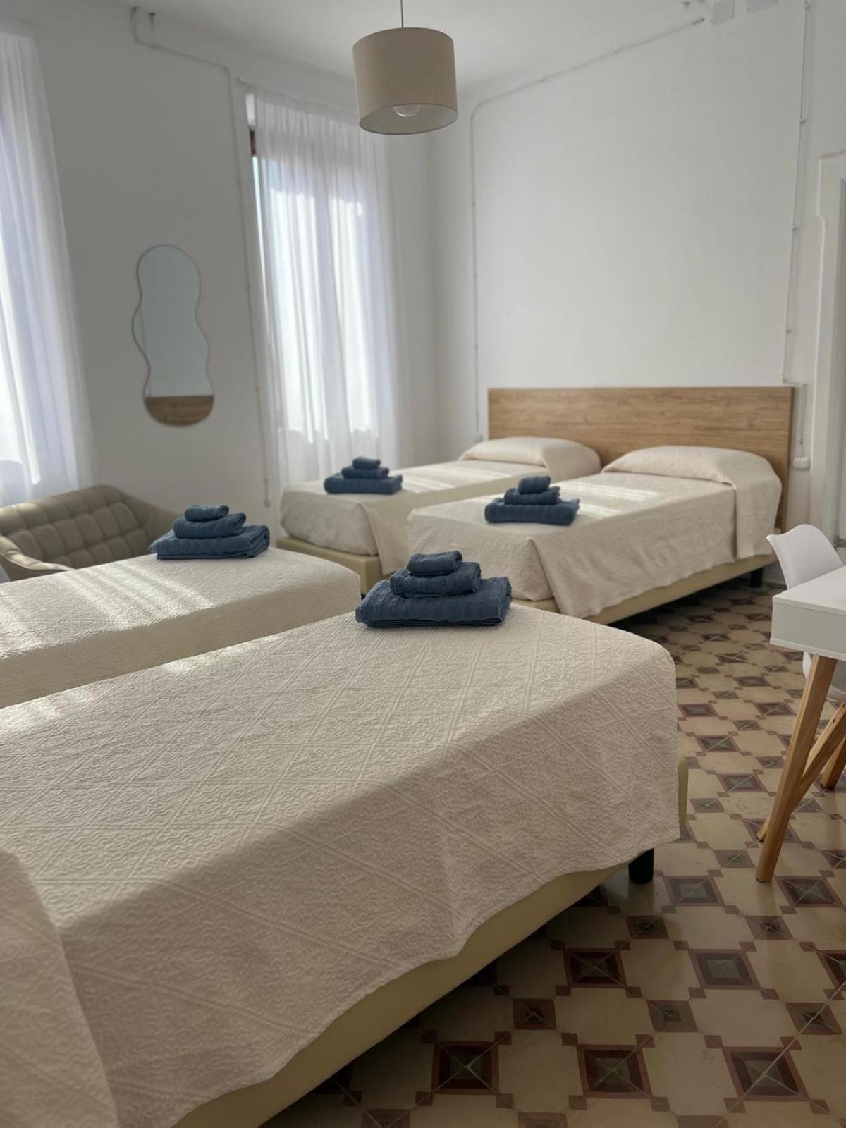 Quadruple Room with Private Bathroom photo 1