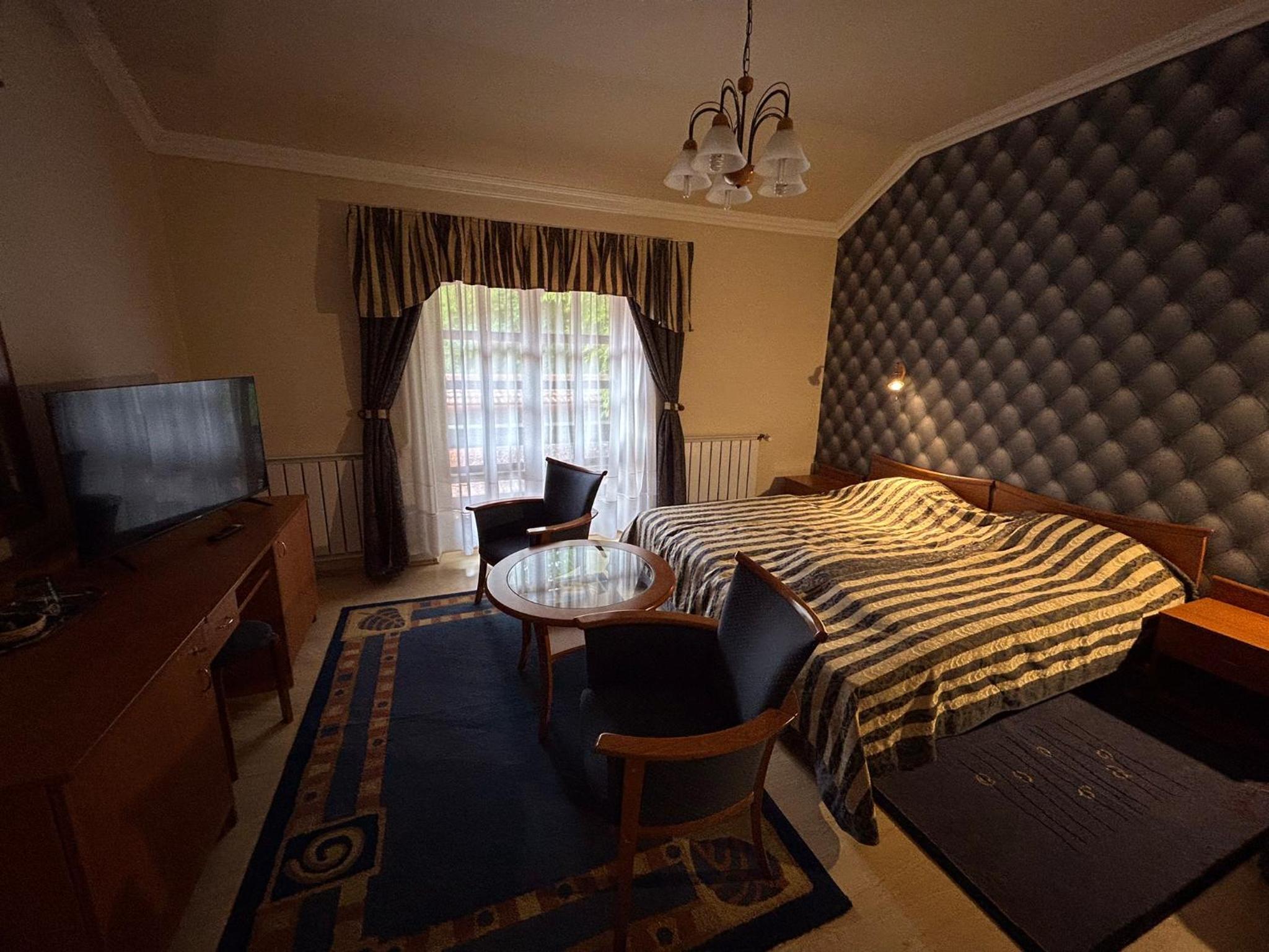 Deluxe Double Room (2 Adults + 1 Child) photo 1