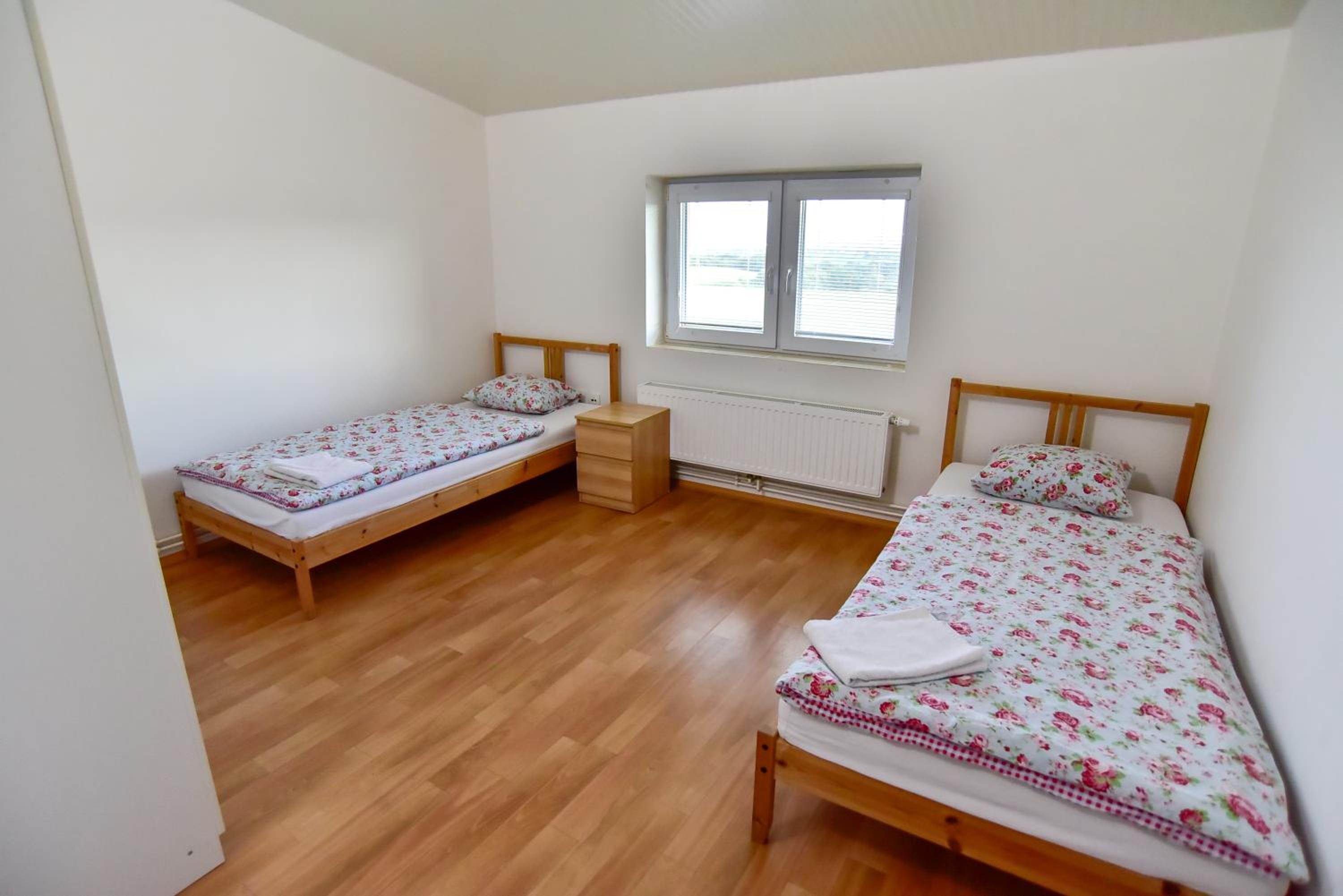 Three-Bedroom Apartment - Photo 61