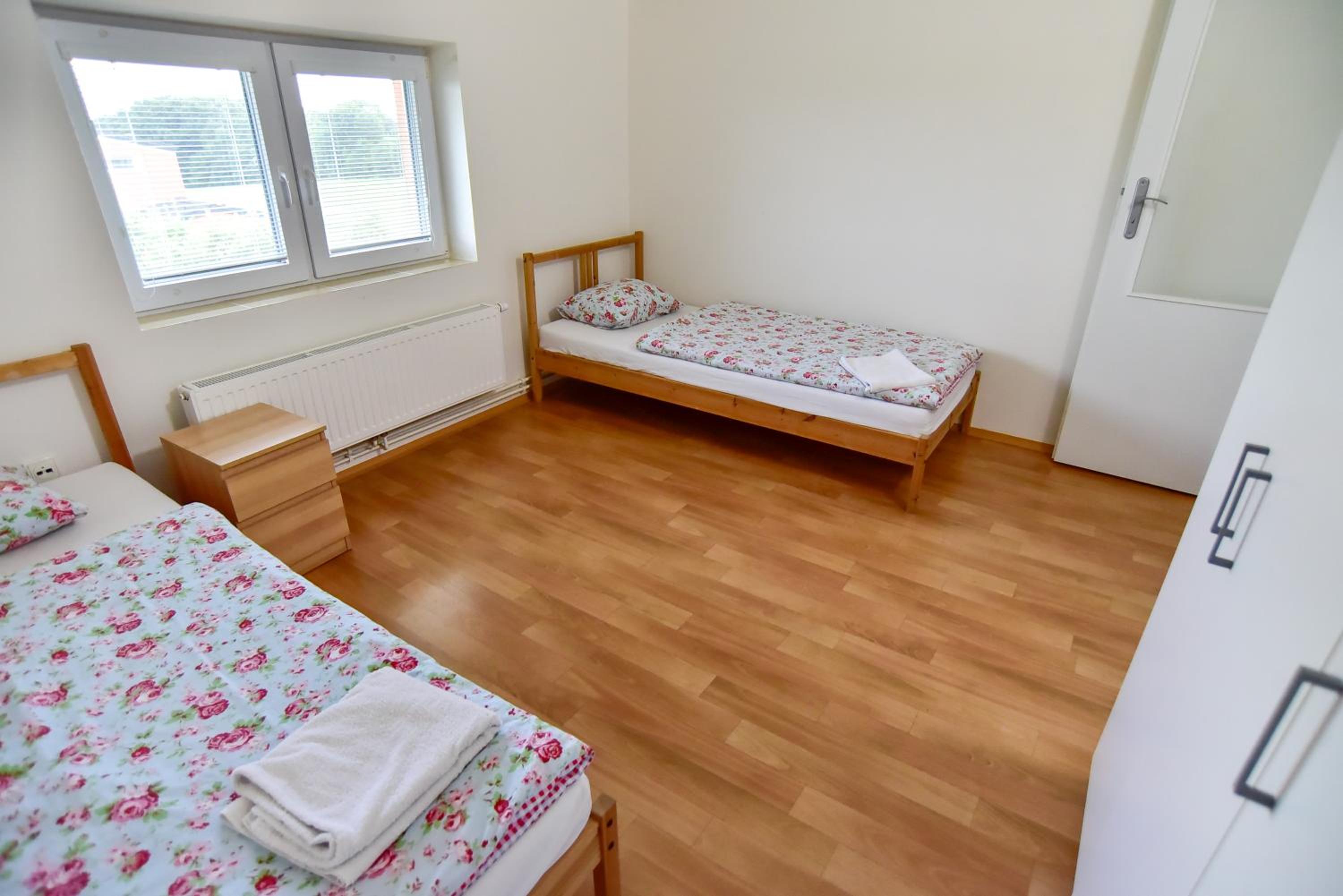 Three-Bedroom Apartment - Photo 60