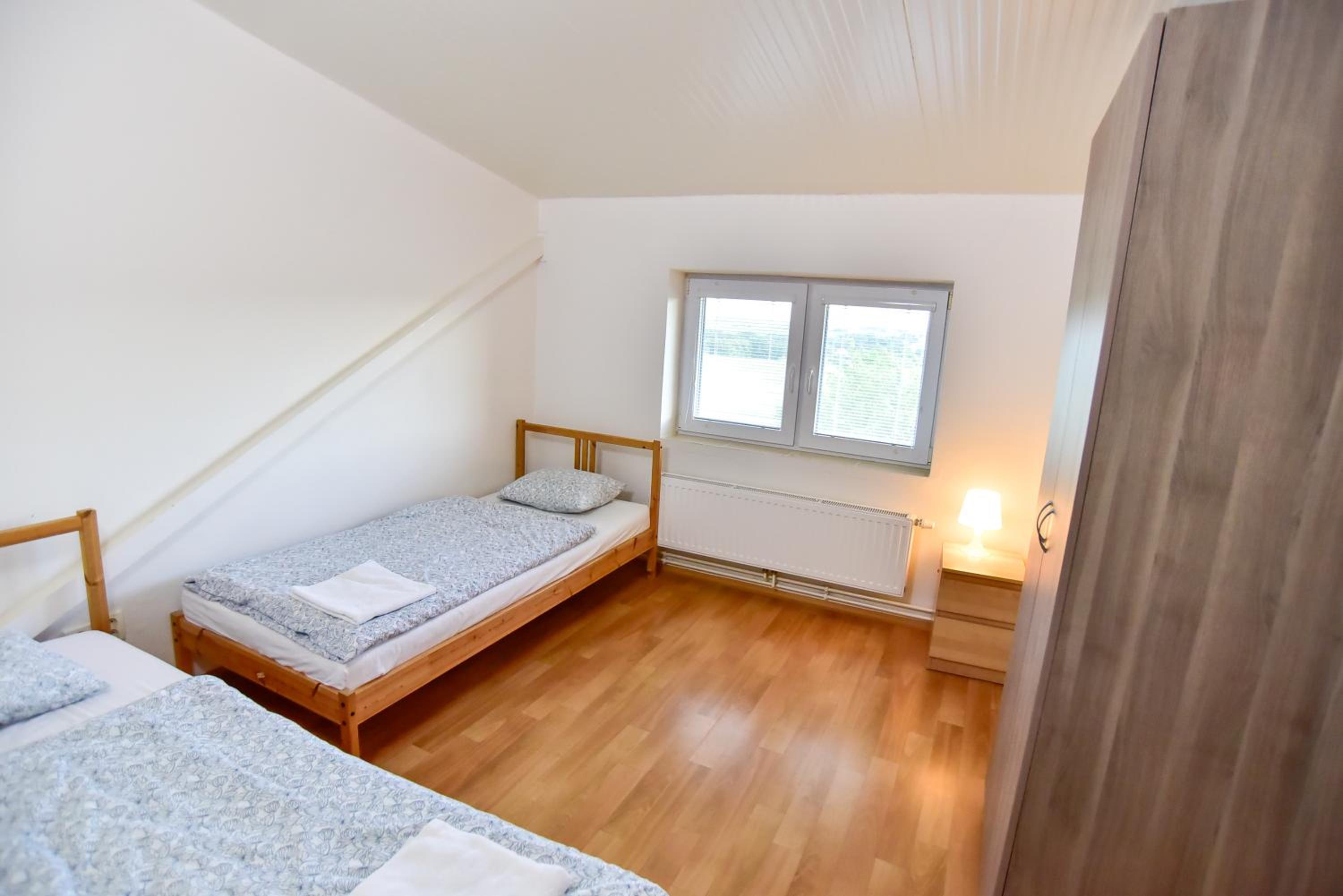 Three-Bedroom Apartment - Photo 17