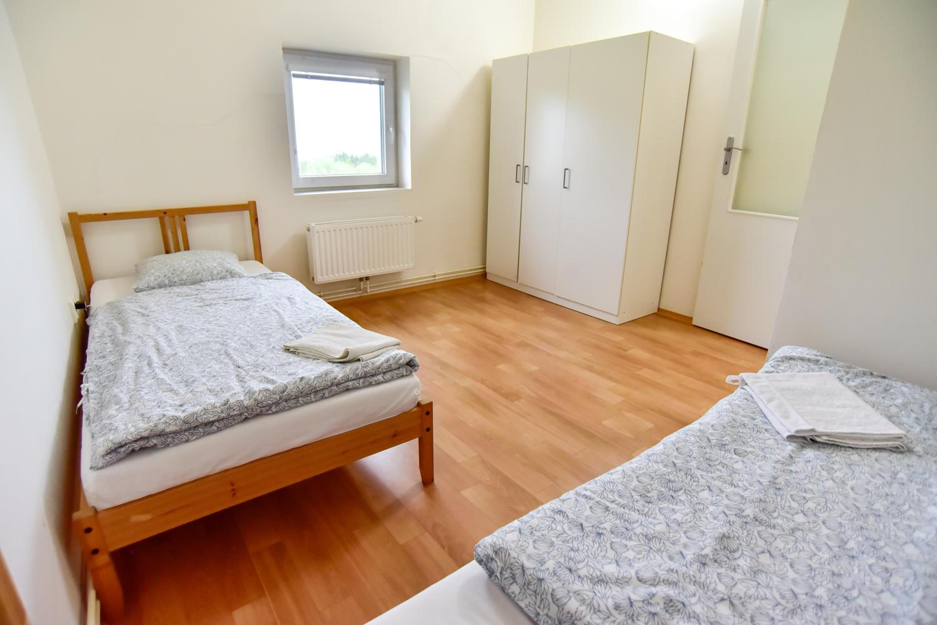 Three-Bedroom Apartment - Photo 65