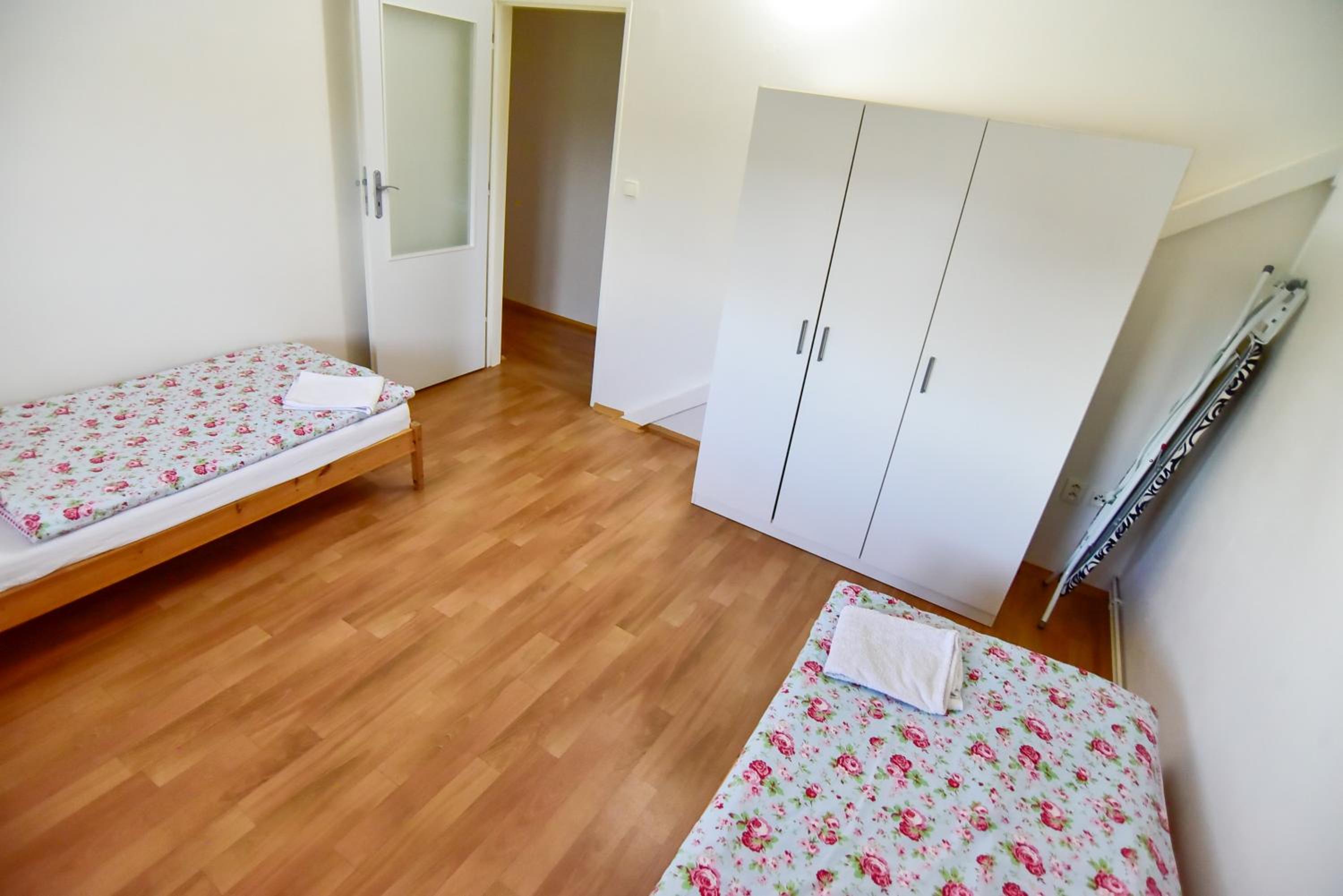 Three-Bedroom Apartment - Photo 63