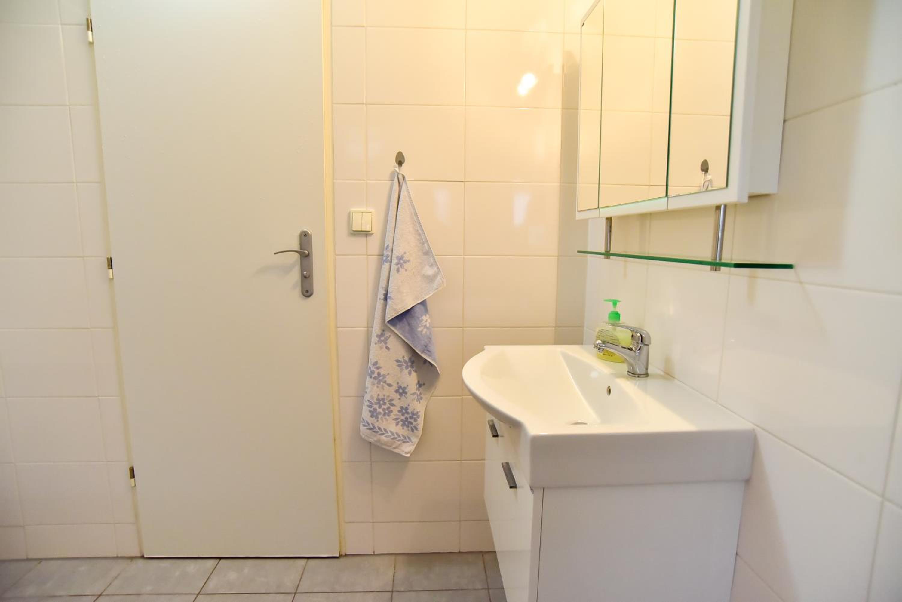 Three-Bedroom Apartment - Photo 12