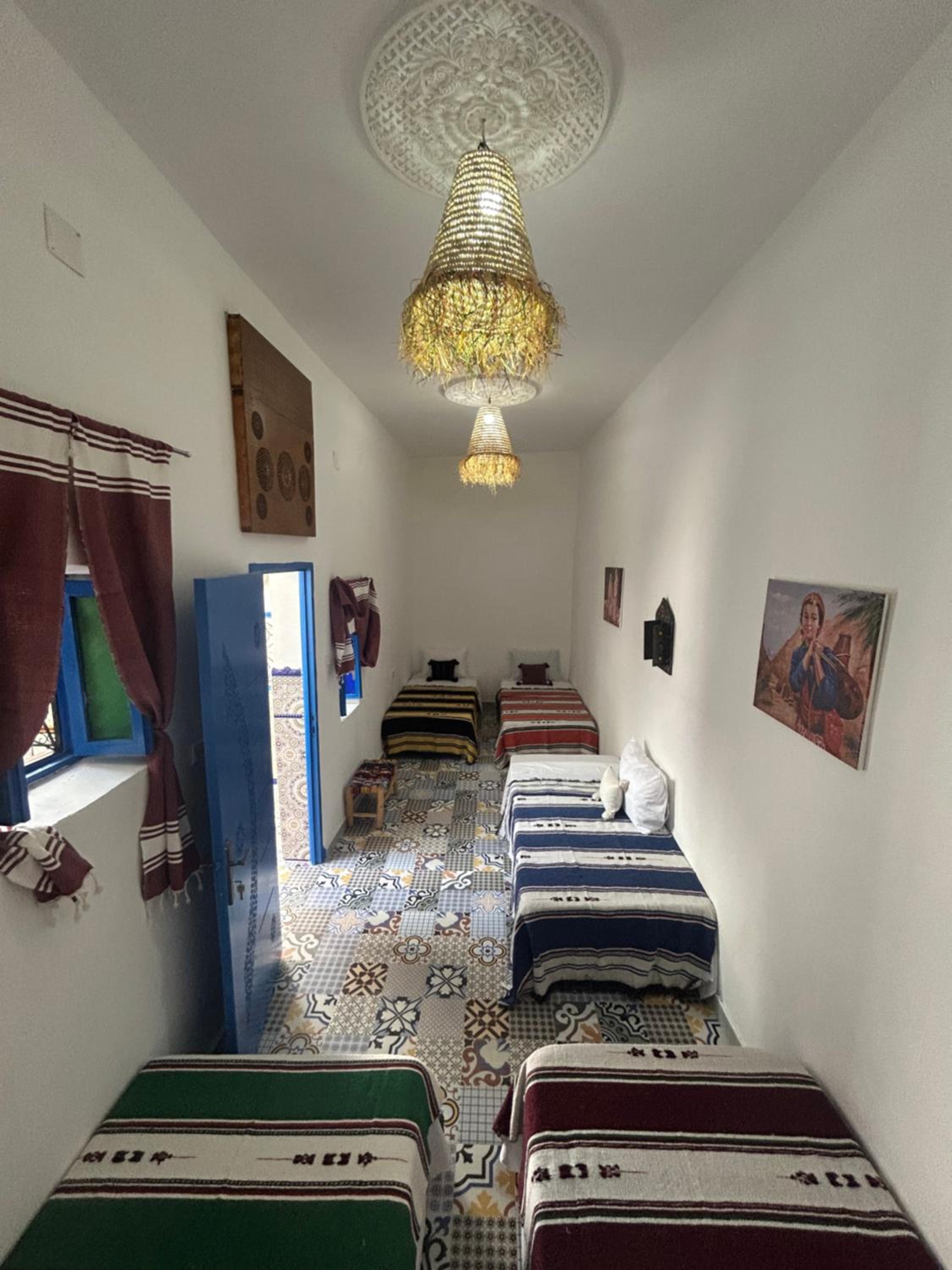 Quadruple Room with Shared Bathroom